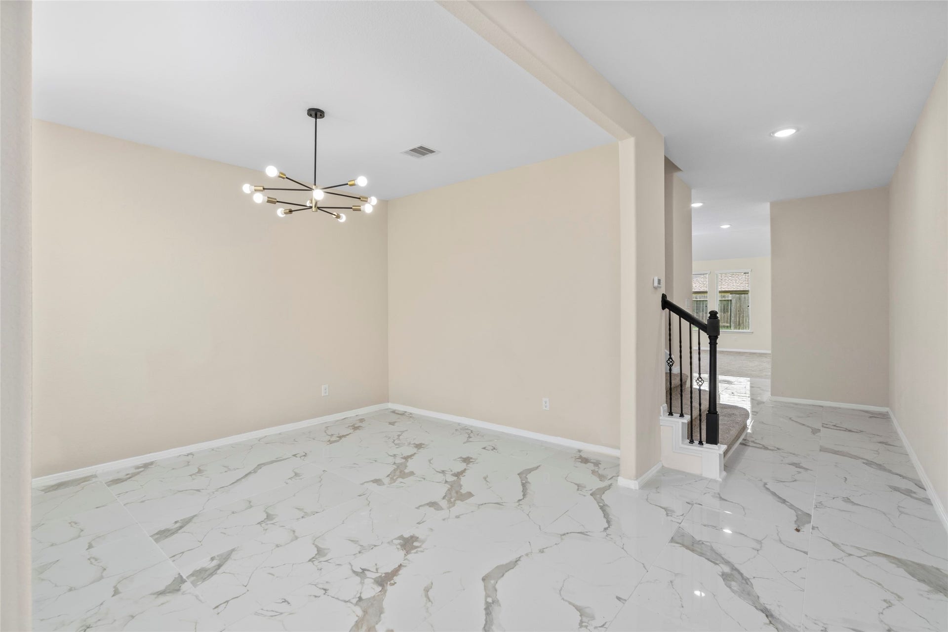 9423 Mineral Rock Lane, Richmond, TX 77407 The formal dining area flows effortlessly with tile flooring, ready to host every dinner party or holiday gathering.