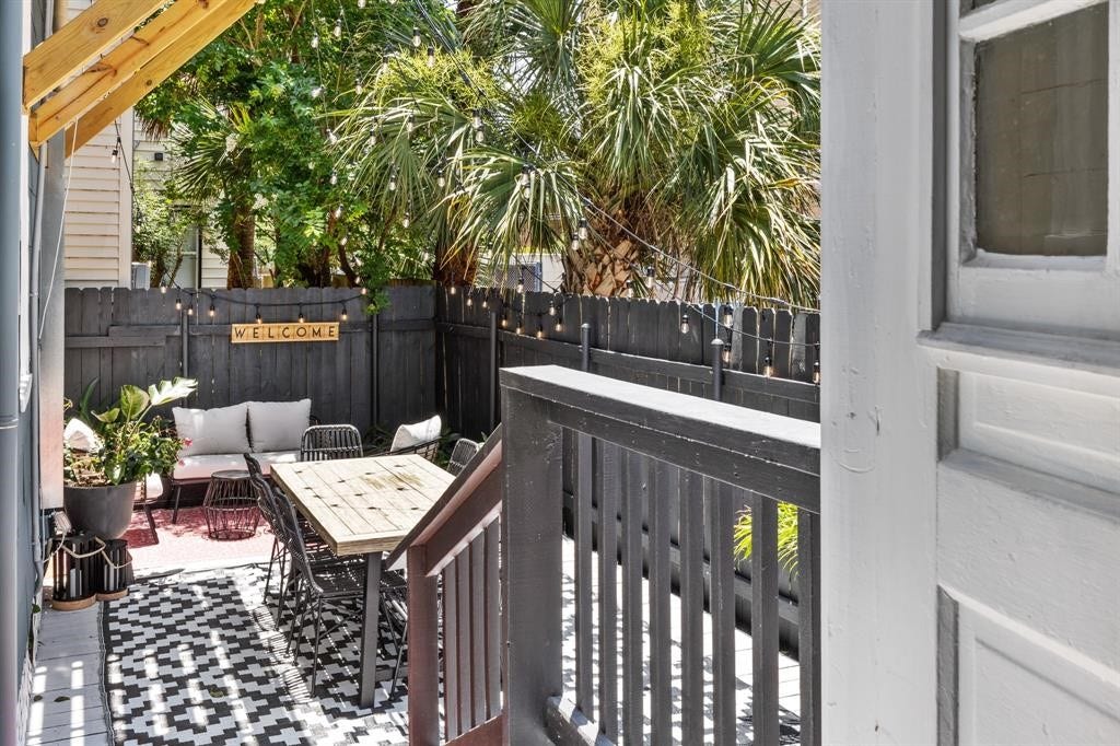 801 24th Street, Galveston, TX 77550 Backyard deck offers seating space.