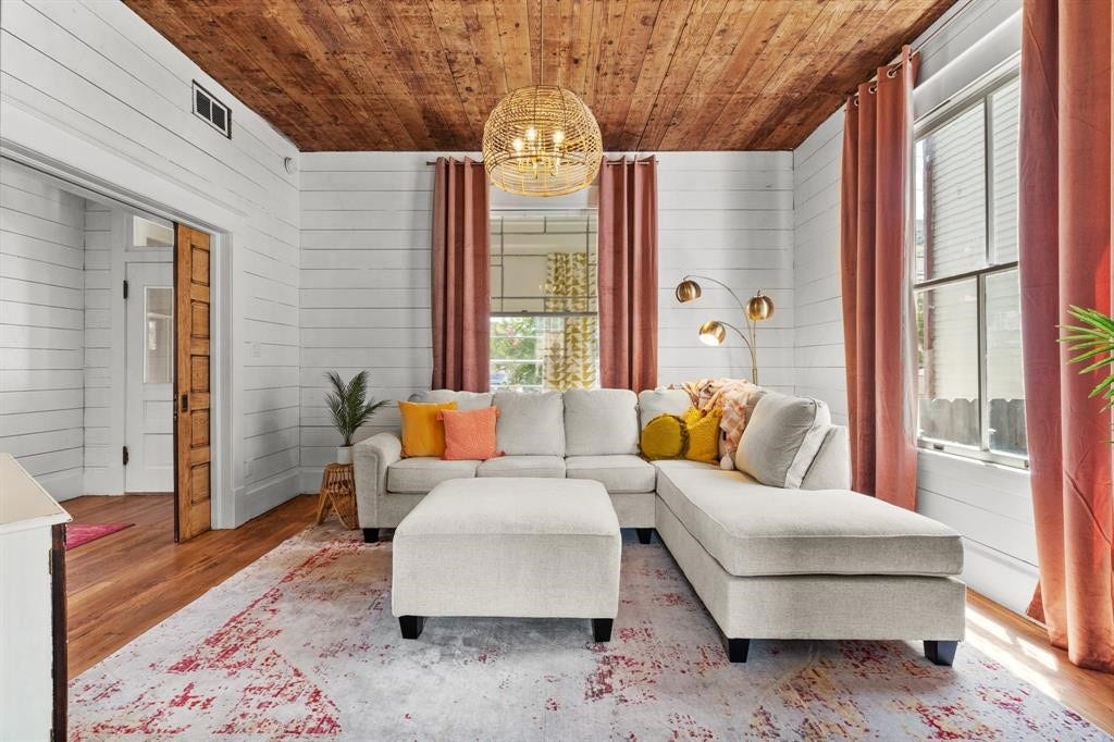 801 24th Street, Galveston, TX 77550 Living room right off the entry surrounded by windows letting in natural light