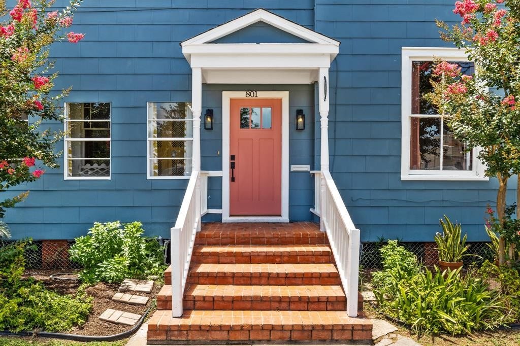 801 24th Street, Galveston, TX 77550 Covered front stoop leading to the entry.