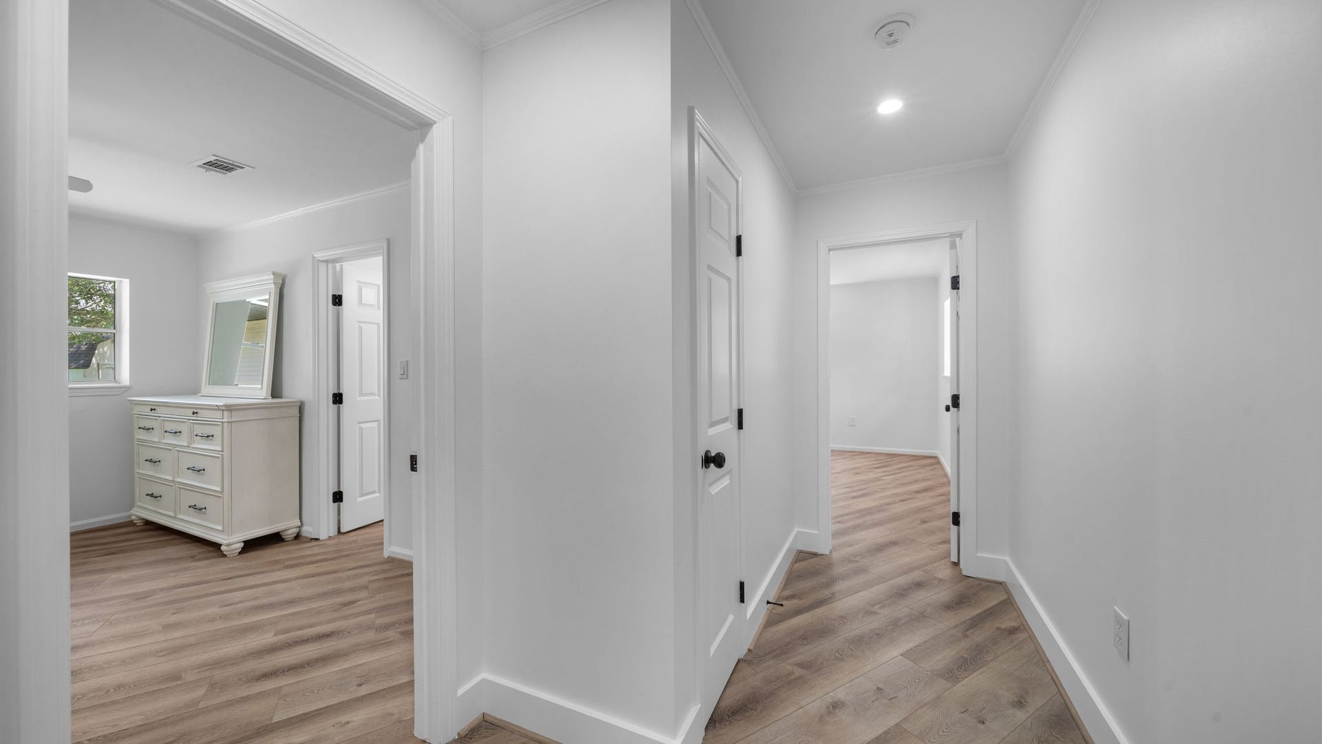 15502 Kitty Hawk Drive, Waller, TX 77484 Secondary bedroom wing hallway, and linen closet, behind barn door