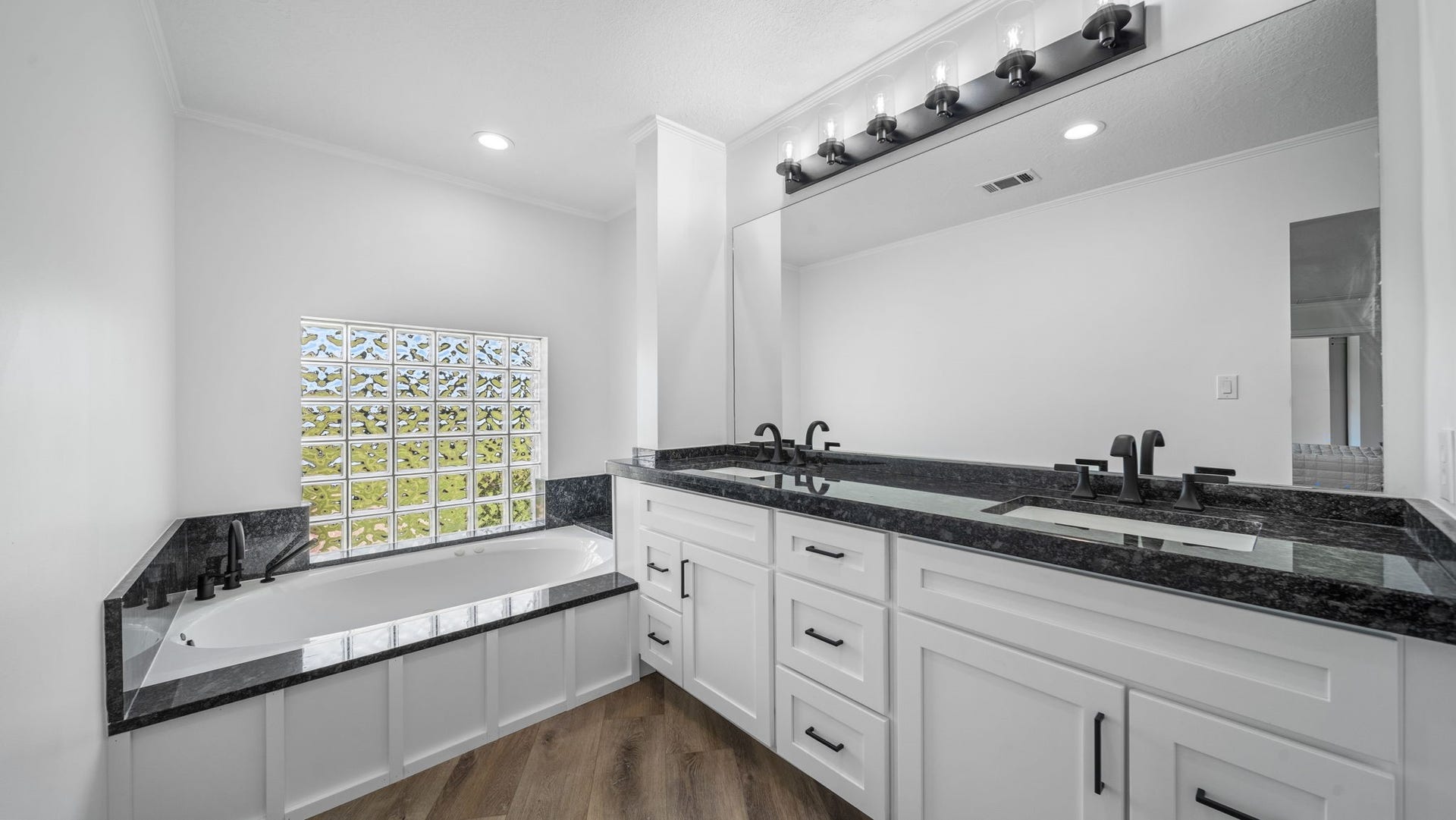 15502 Kitty Hawk Drive, Waller, TX 77484 Large Primary jetted tub, double sinks all new cabinets, granite, fixtures, lights