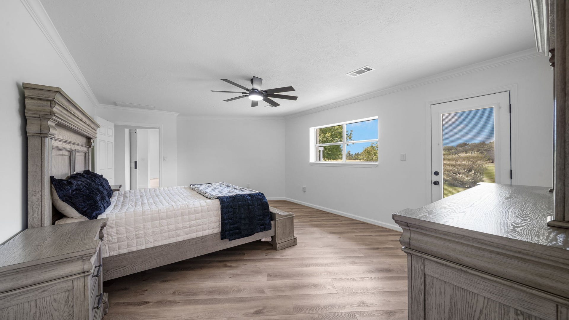15502 Kitty Hawk Drive, Waller, TX 77484 Large Primary bedroom, has exterior door leading to your deck, walk in closet