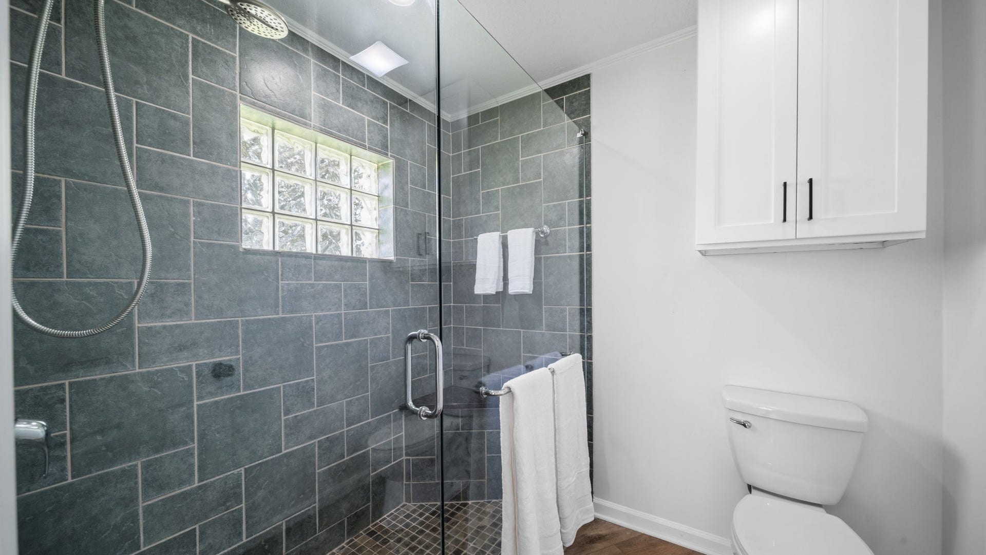 15502 Kitty Hawk Drive, Waller, TX 77484 Private Primary Shower Large walk in shower, natural light and with built in cabinet
