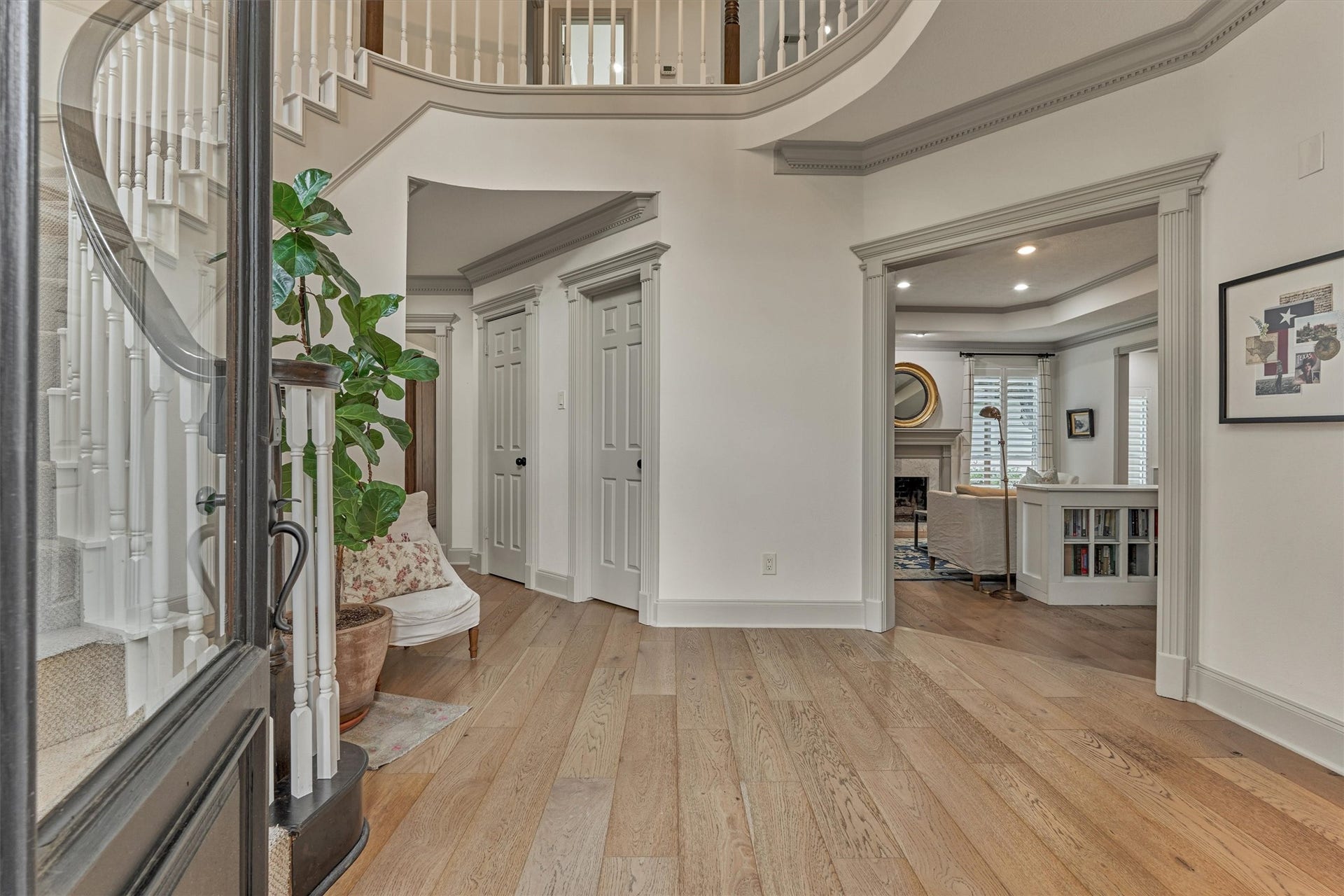42 Golden Shadow Circle, The Woodlands, TX 77381 Step inside this lightly lived-in, custom home featuring soaring ceilings, continuous French oak wood flooring, and extensive millwork detail throughout. Note incredible storage options at every turn!