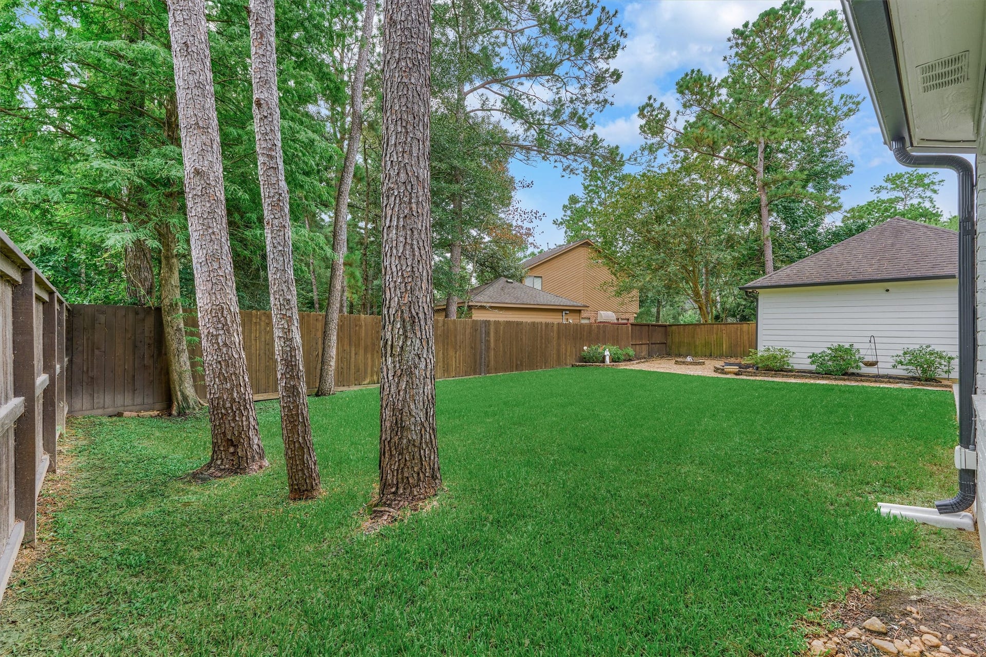 42 Golden Shadow Circle, The Woodlands, TX 77381 Enjoy the flexibility of a generously sized backyard with space for play equipment, a pool, and all your outdoor living dreams.