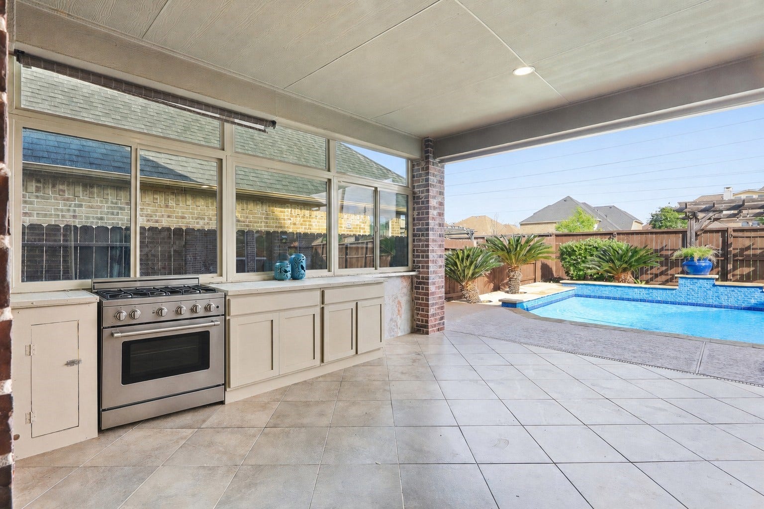 4130 Clover Ridge Lane, Sugar Land, TX 77479 Second kitchen area while enjoying the outdoors.