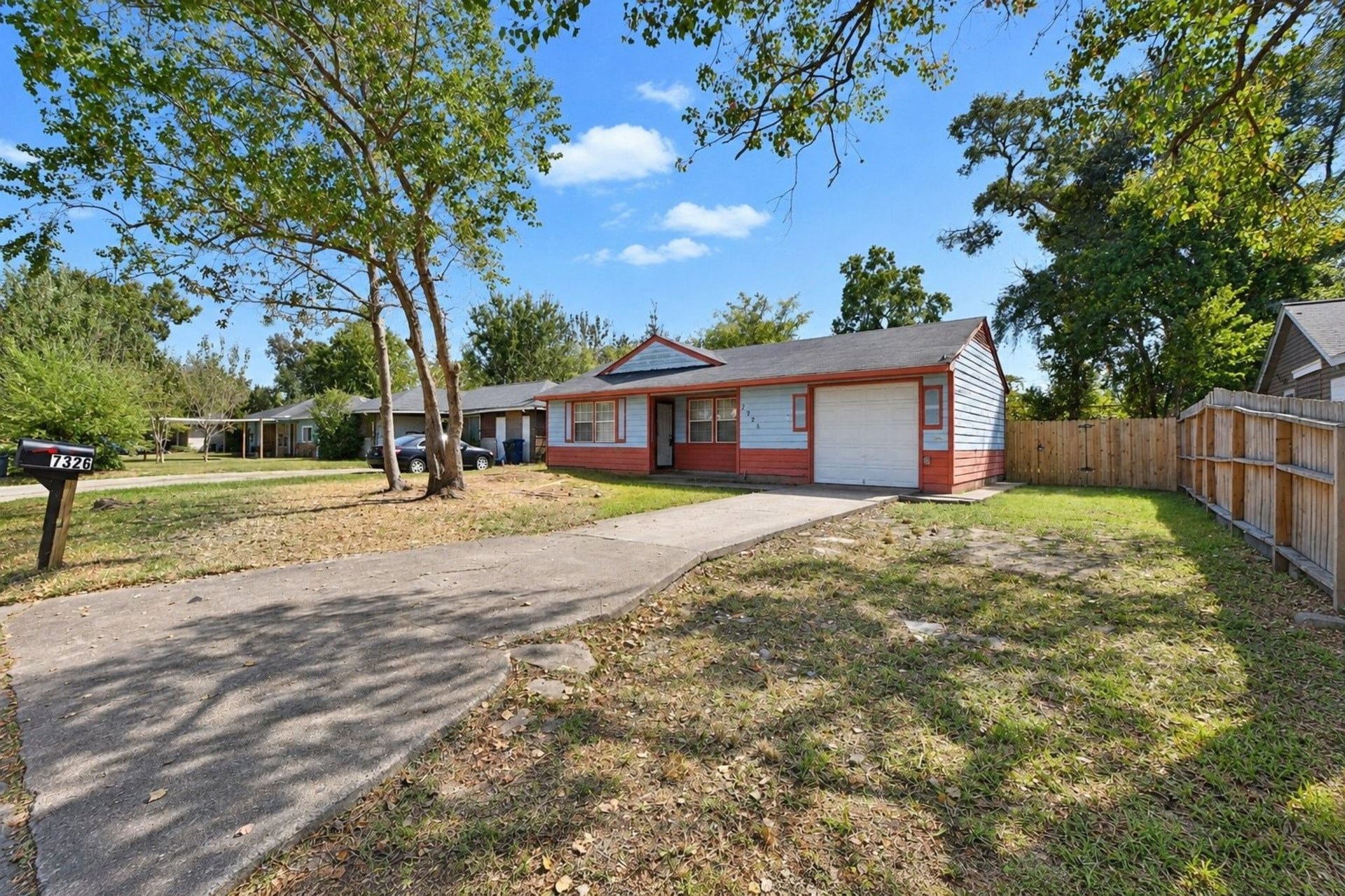 Single-family home nestled in Scenic Woods neighborhood.