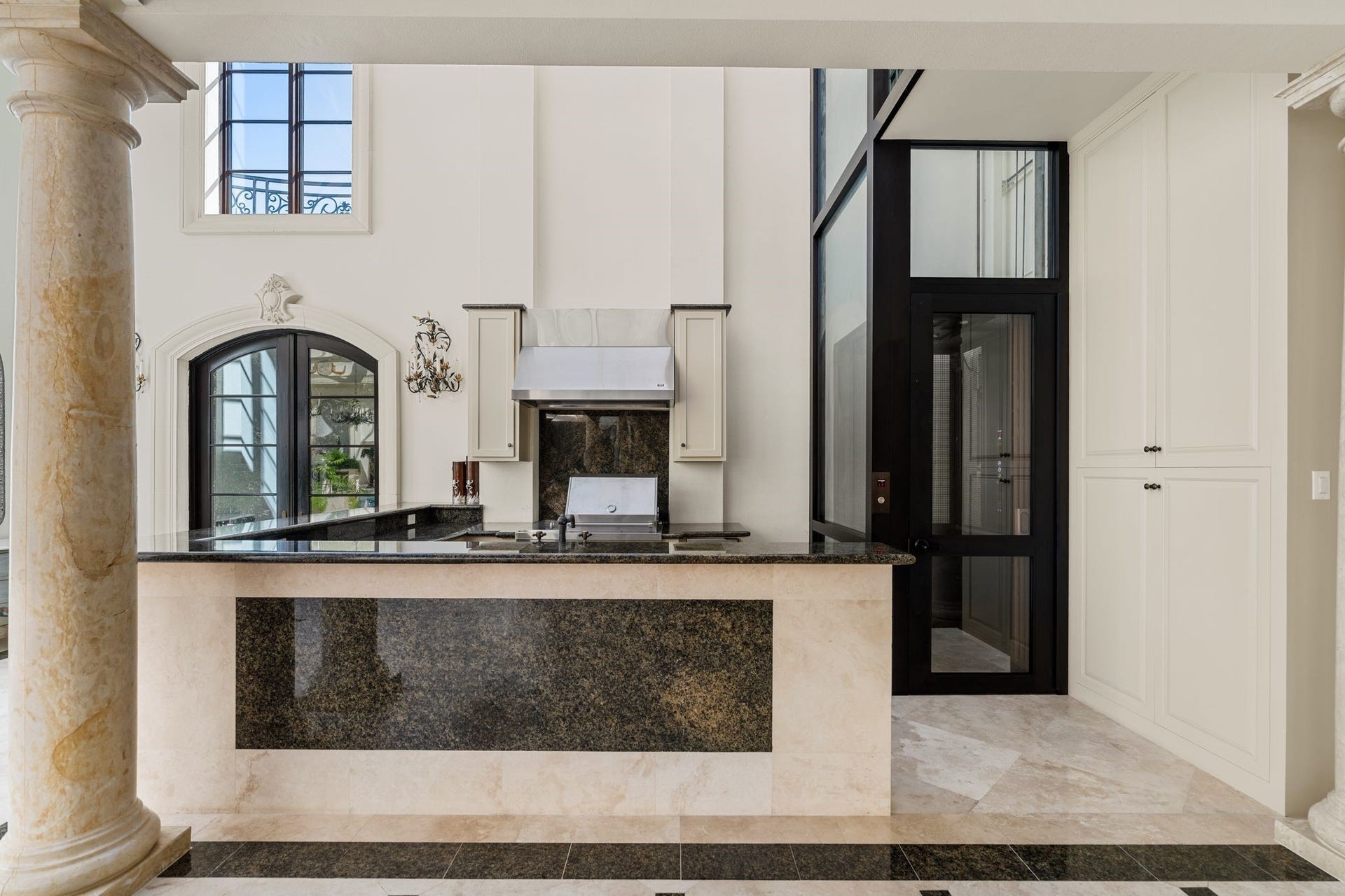2115 River Oaks Boulevard, Houston, TX 77019 Newly added elevator access to the primary second floor and atrium overview.