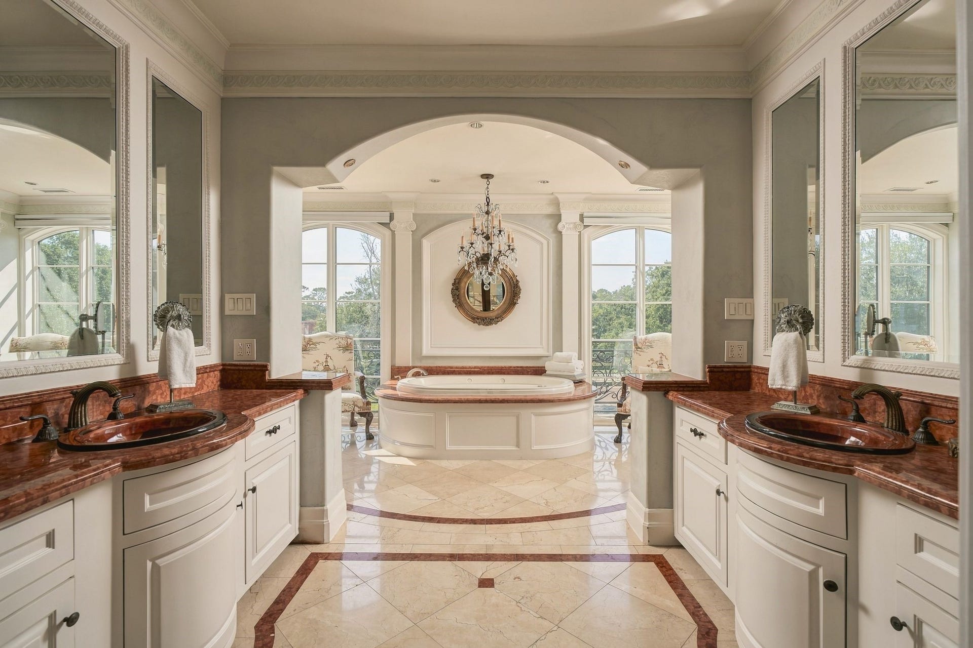 2115 River Oaks Boulevard, Houston, TX 77019 Primary ensuite with marble flooring, jetted tub and natural lighting.