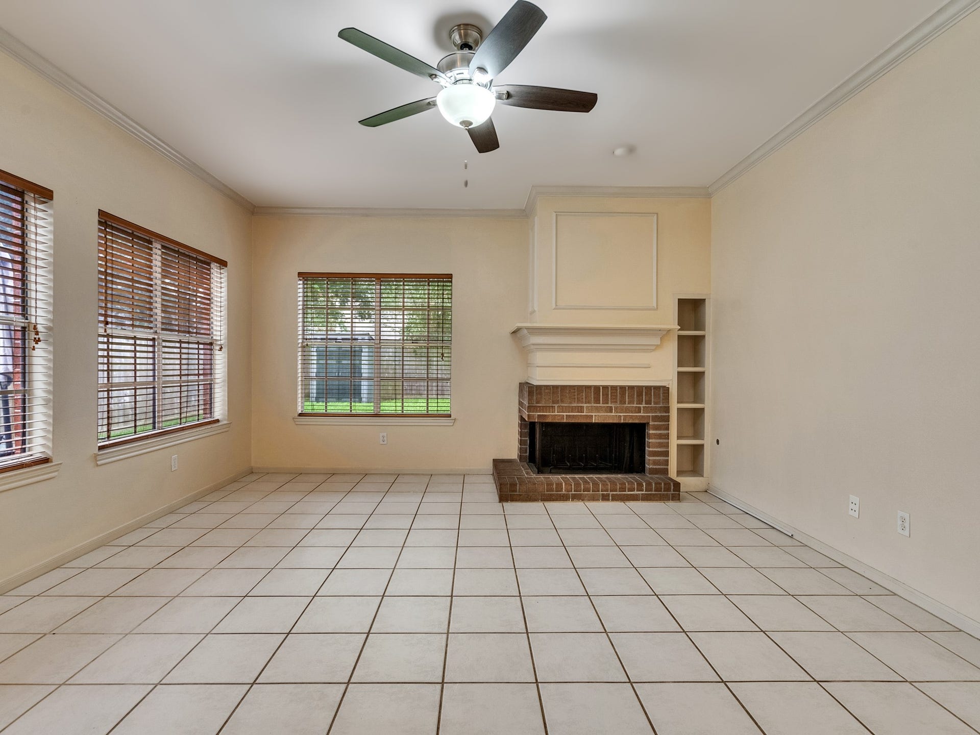 View of the living room that receives an abundance of natural light
