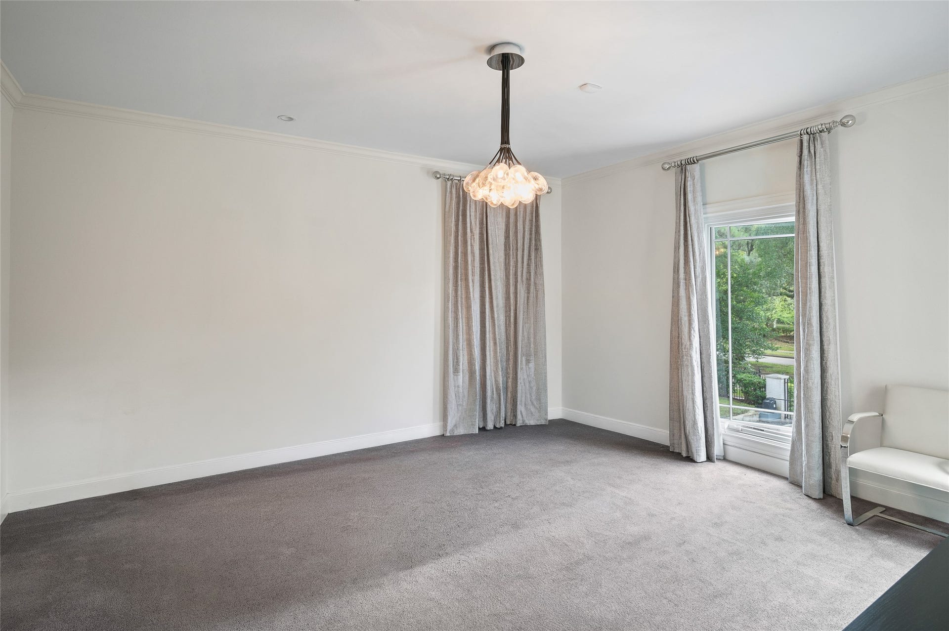 [En Suite Bedroom]
Amenities include a custom-fitted closet and en suite bath.