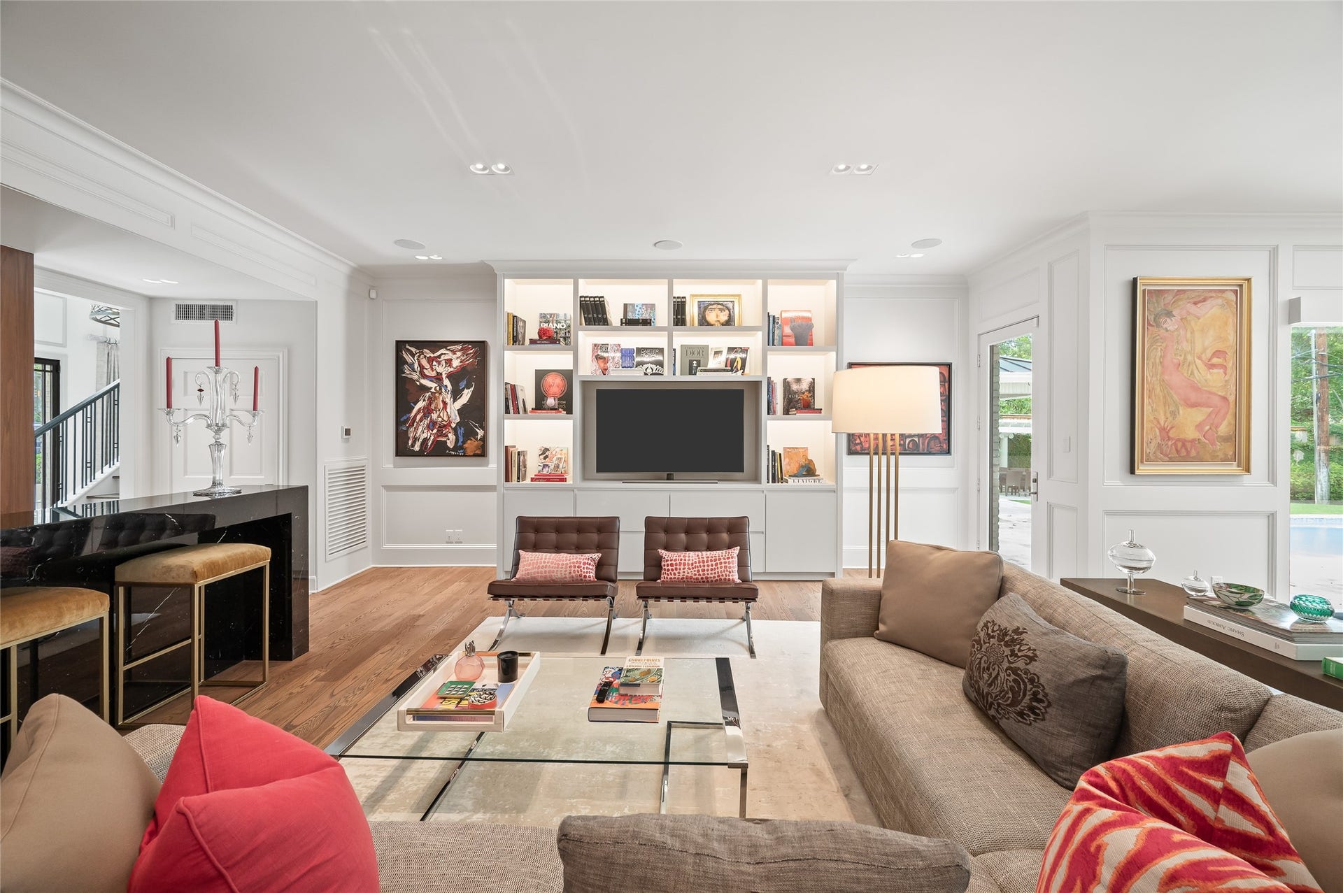[Family Room]
This portion of the family room includes a media / display cabinet and glass door to the patio.