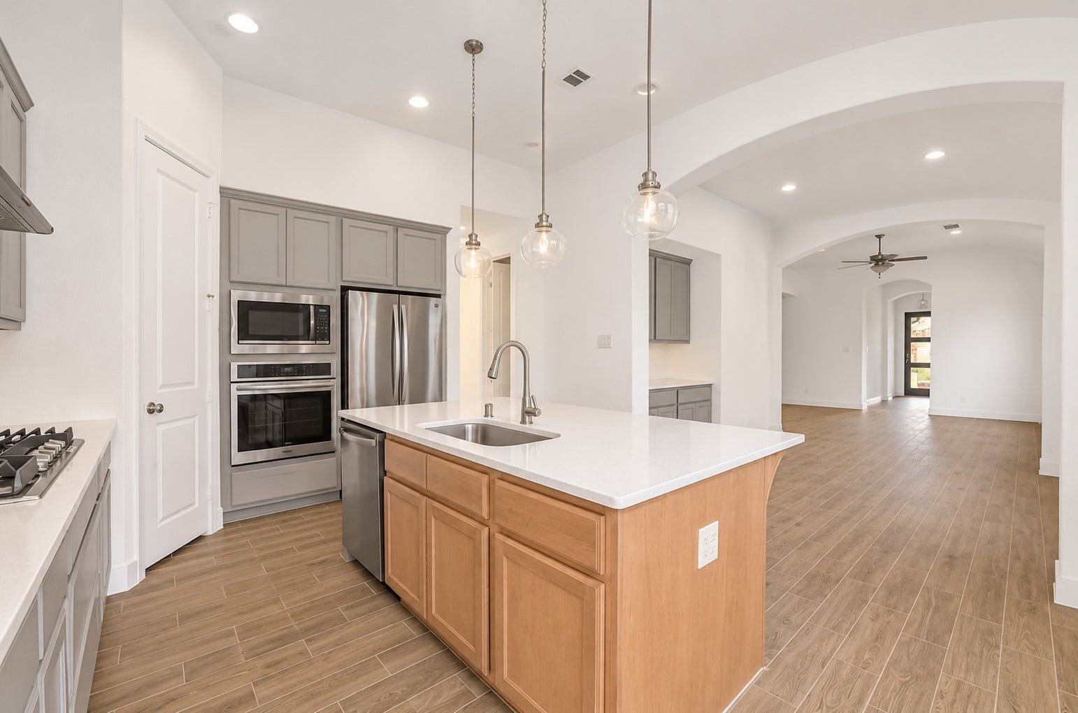 20943 Blooming Shrubs Court, Cypress, TX 77433 Gorgeous kitchen is open into the living and dining areas.