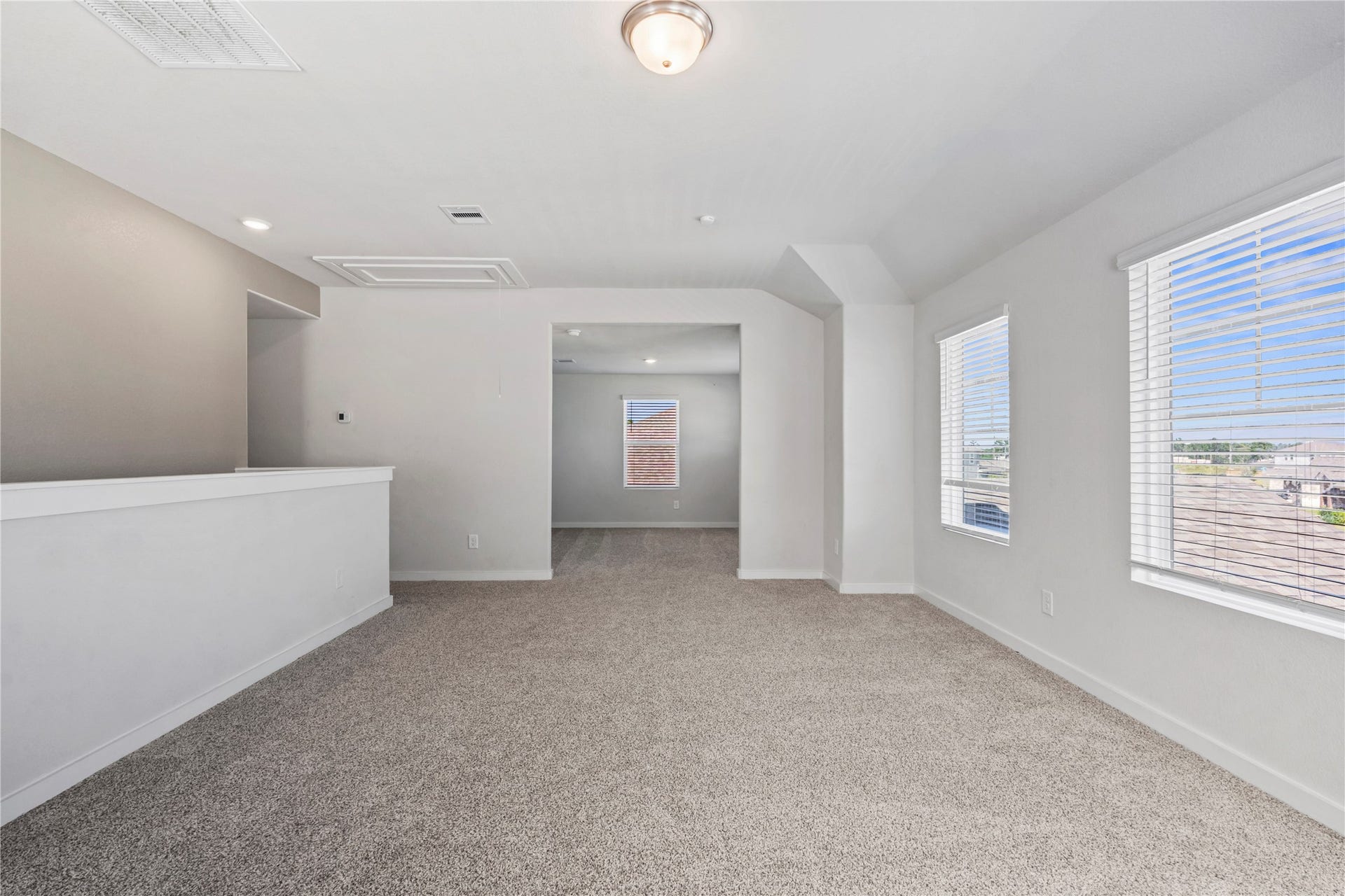 38527 Winding Meadows Drive, Magnolia, TX 77354 View of the game room and flex space upstairs.