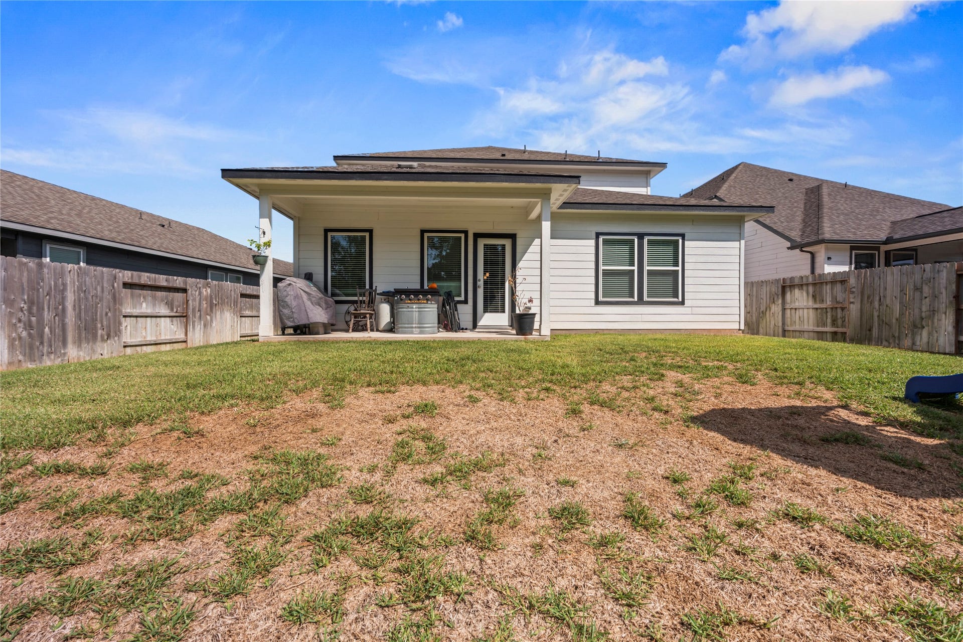38527 Winding Meadows Drive, Magnolia, TX 77354 Covered back patio.