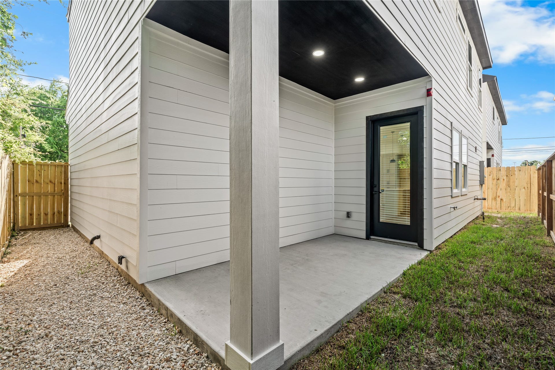4702 & 1912 Schweikhardt Street, Houston, TX 77020 Low-maintenance luxury. The fenced-in yard offers the ideal blend of green grass and clean gravel pathways, giving you a secure pet-friendly space without endless weekend yard work.