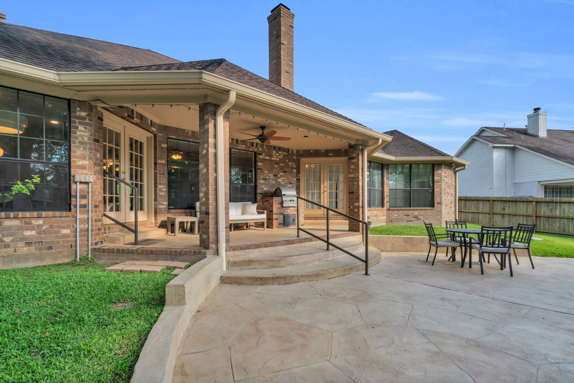 23327 Cannon Creek Trail, Tomball, TX 77377 Covered outdoor living area extends the homes entertaining space into the backyard.
