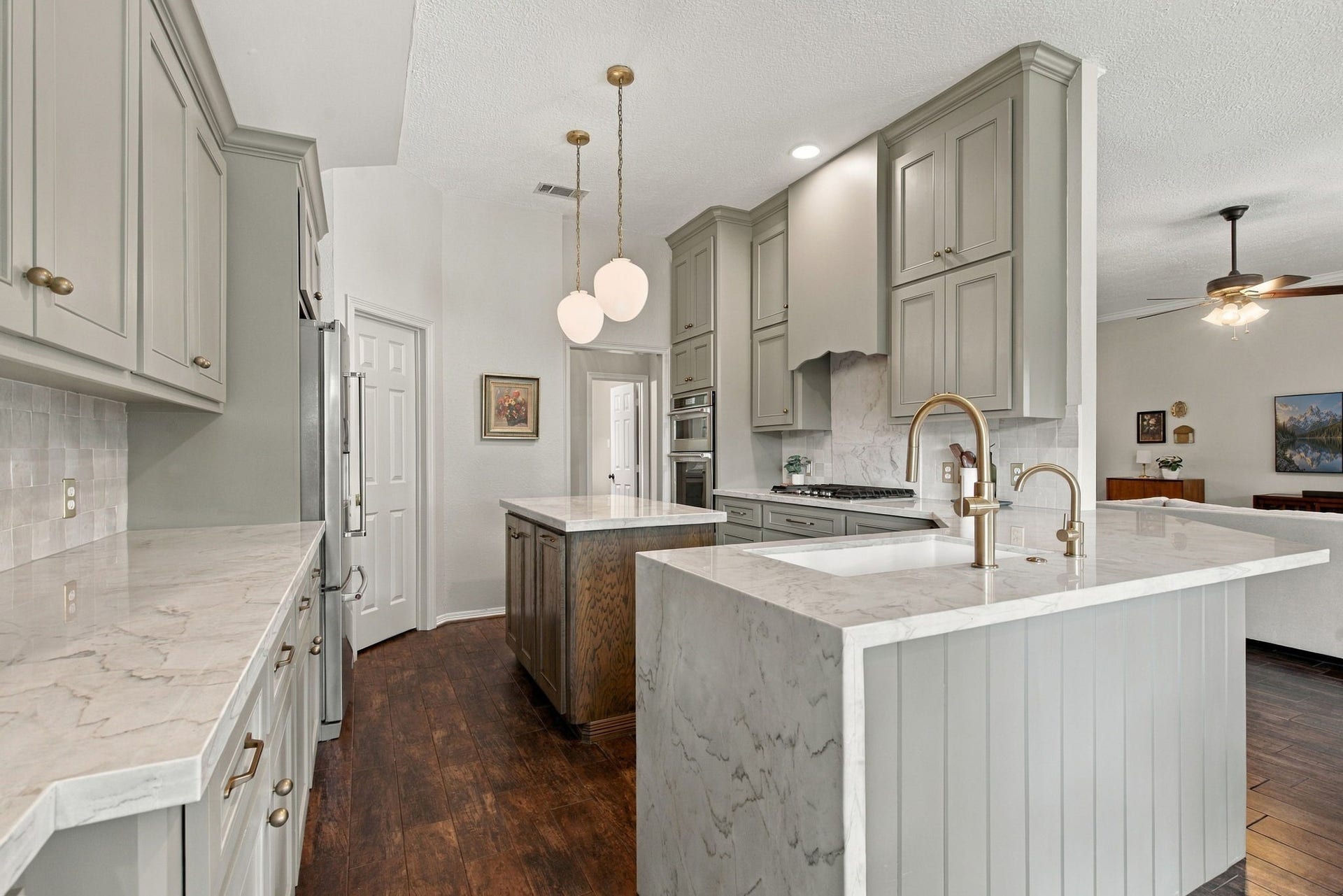 23327 Cannon Creek Trail, Tomball, TX 77377 Updated kitchen offers abundant cabinetry, expansive counter space, and a center island.