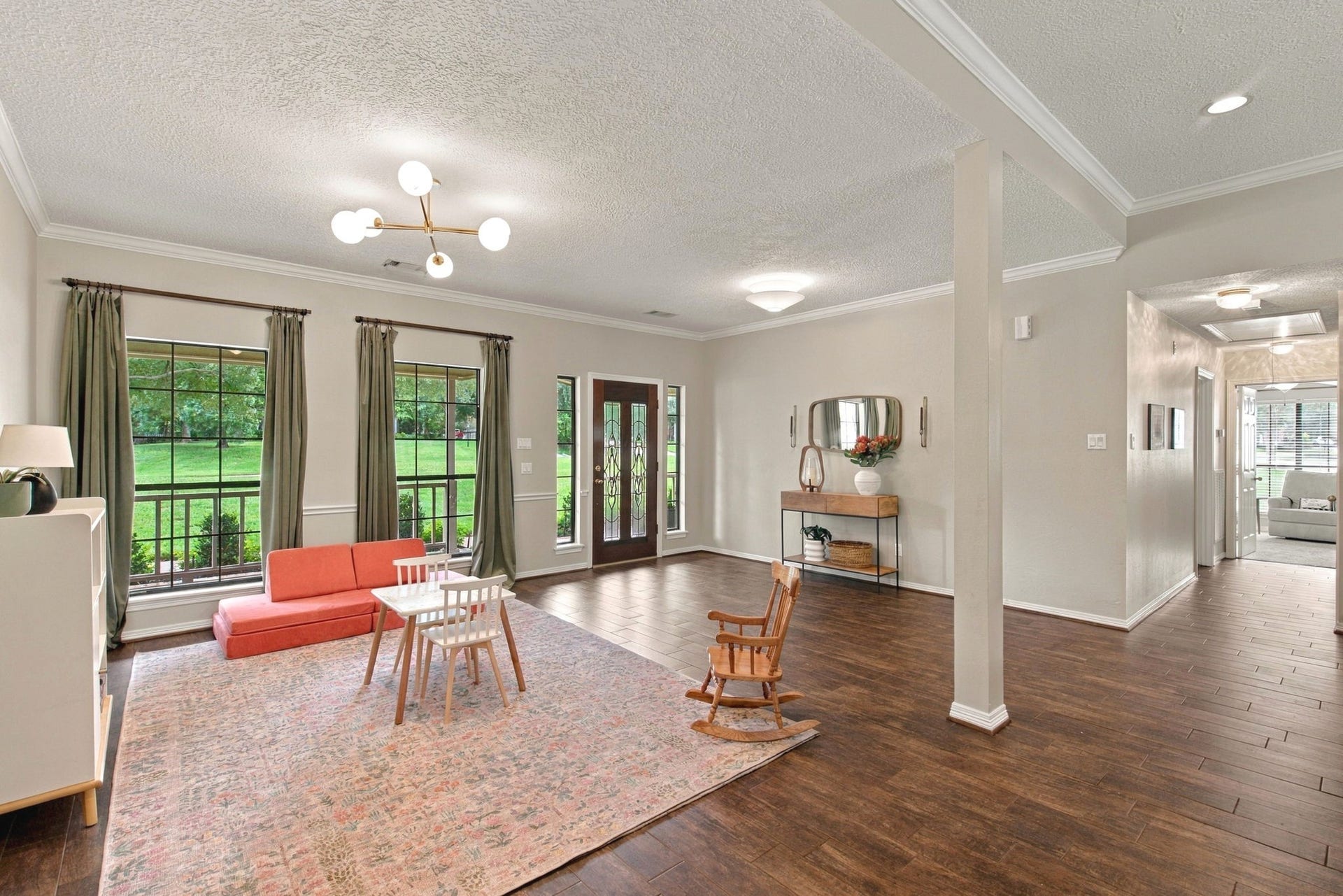 23327 Cannon Creek Trail, Tomball, TX 77377 Light-filled dining room with large windows overlooking the front yard.