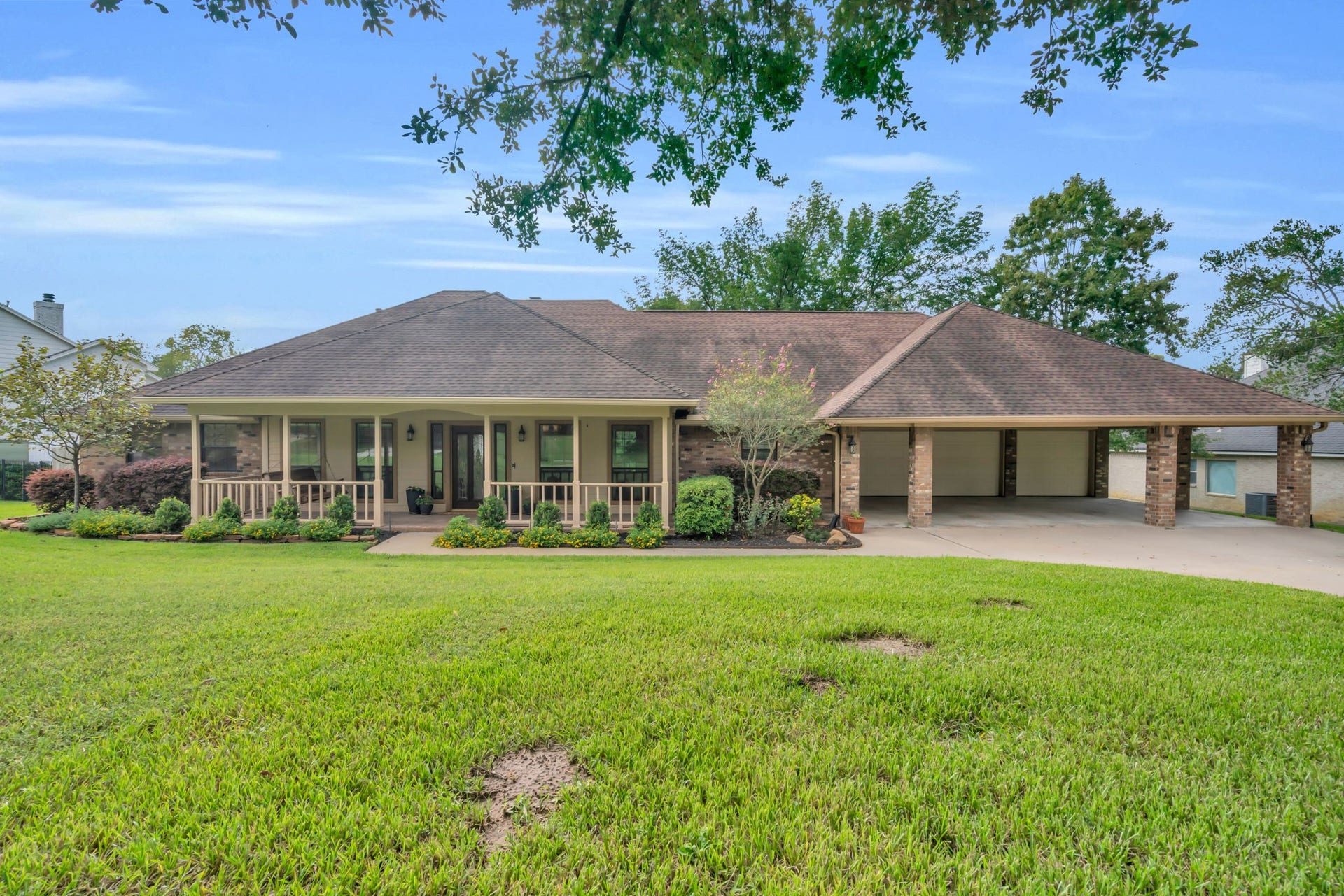 23327 Cannon Creek Trail, Tomball, TX 77377 Another look at the homes inviting exterior and expansive driveway.