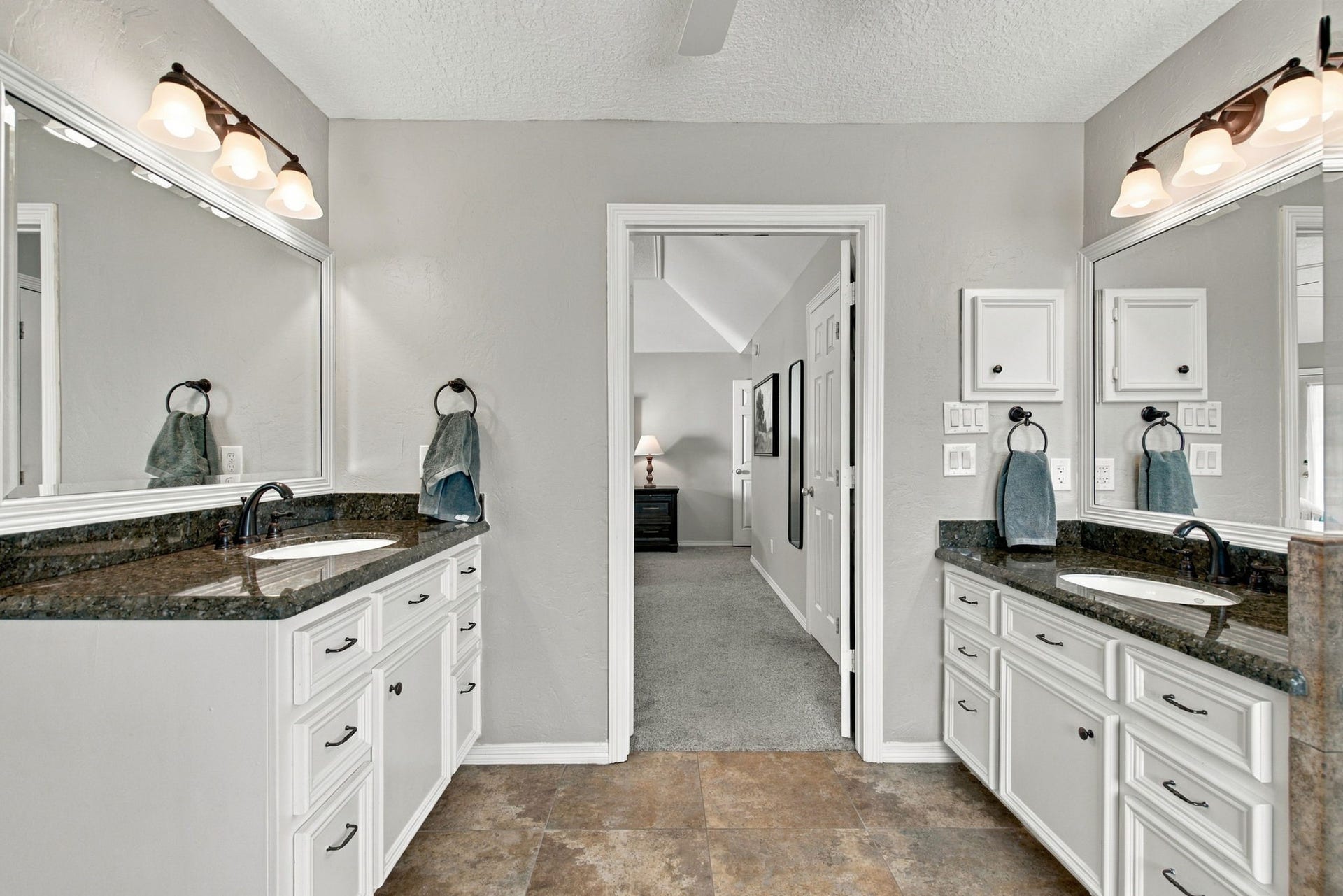 23327 Cannon Creek Trail, Tomball, TX 77377 Separate vanities provide plenty of counter space and storage in the primary bath.