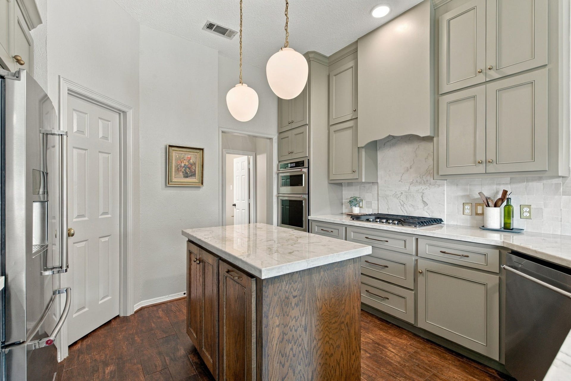 23327 Cannon Creek Trail, Tomball, TX 77377 Center island adds additional prep space and storage to the kitchen.
