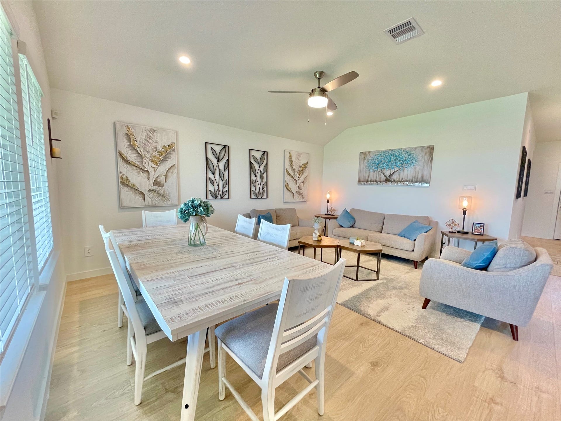 31722 Farlam Farms Trail, Fulshear, TX 77441 Host unforgettable dinners in this dedicated dining zone, beautifully framed by elegant wall decor and plenty of natural light.