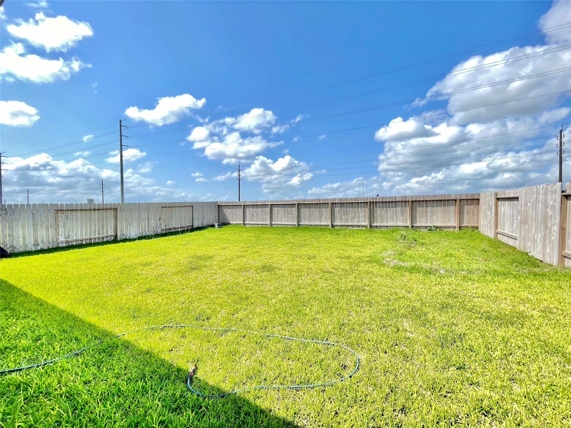 31722 Farlam Farms Trail, Fulshear, TX 77441 A massive, fully fenced backyard offering a completely blank canvas for a future pool, playground, or garden oasis.