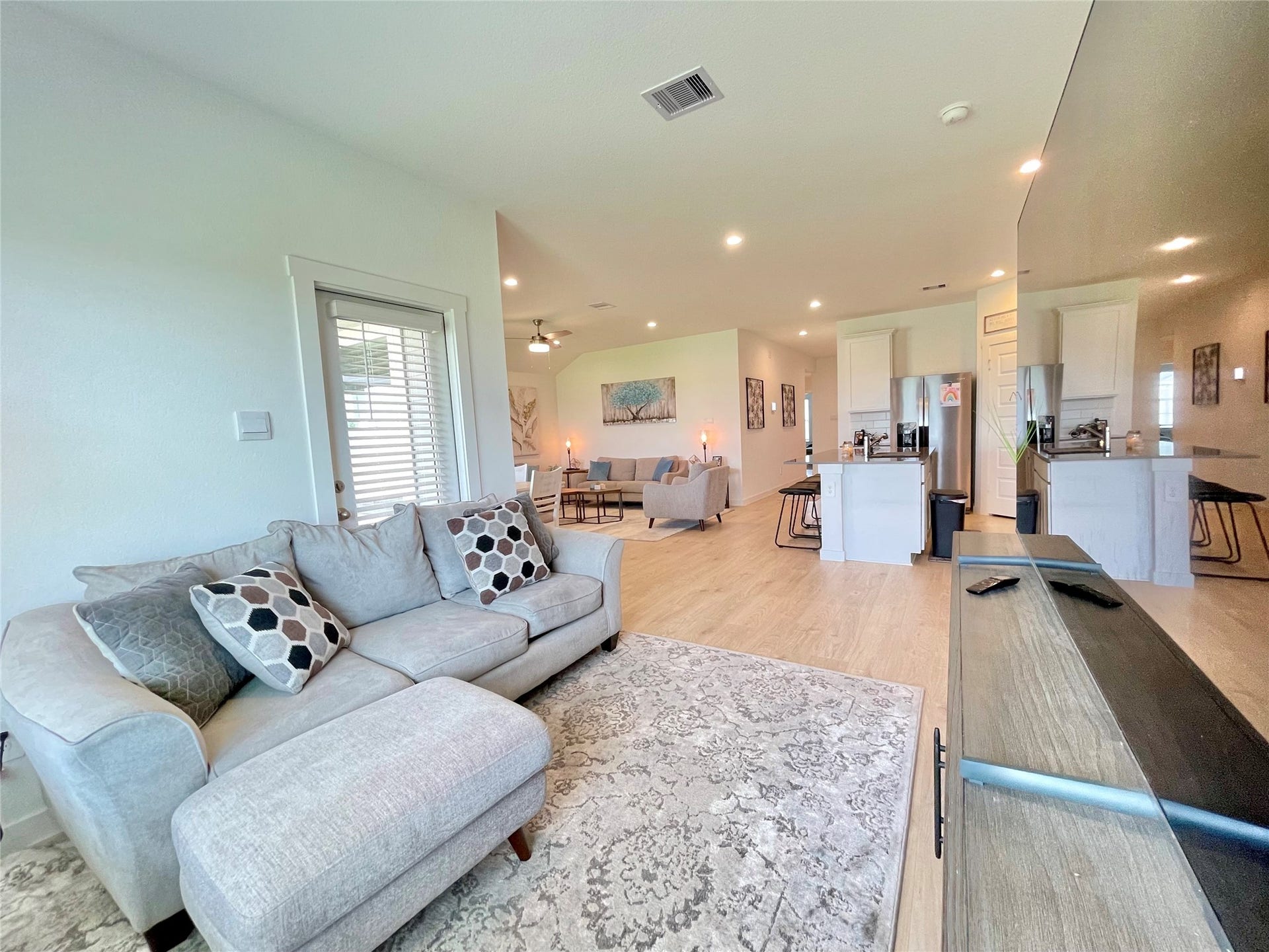 31722 Farlam Farms Trail, Fulshear, TX 77441 Generously sized secondary family room offering endless versatility for a massive sectional, playroom setup, or media center.