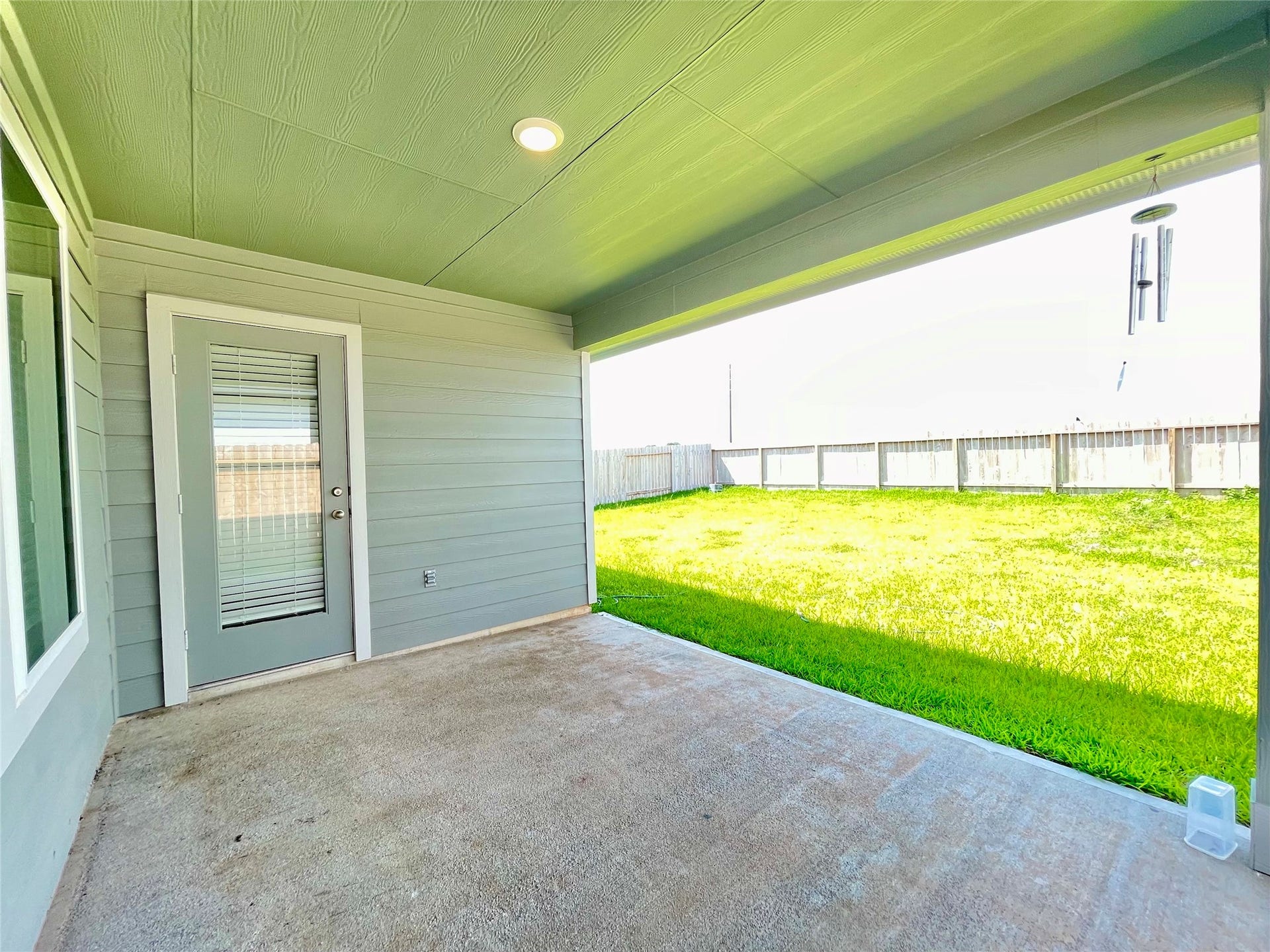 31722 Farlam Farms Trail, Fulshear, TX 77441 Step outside to an expansive, covered back patioyour new go-to spot for morning coffee or weekend BBQs.