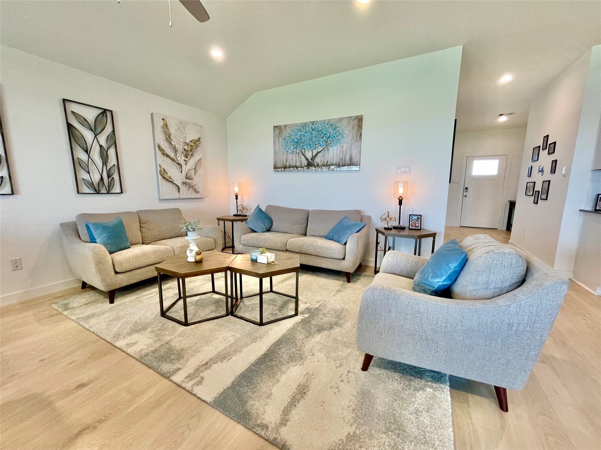 31722 Farlam Farms Trail, Fulshear, TX 77441 The ultimate gathering spot! Relax in style within this beautifully appointed living room, boasting plush seating and a crisp, modern palette.