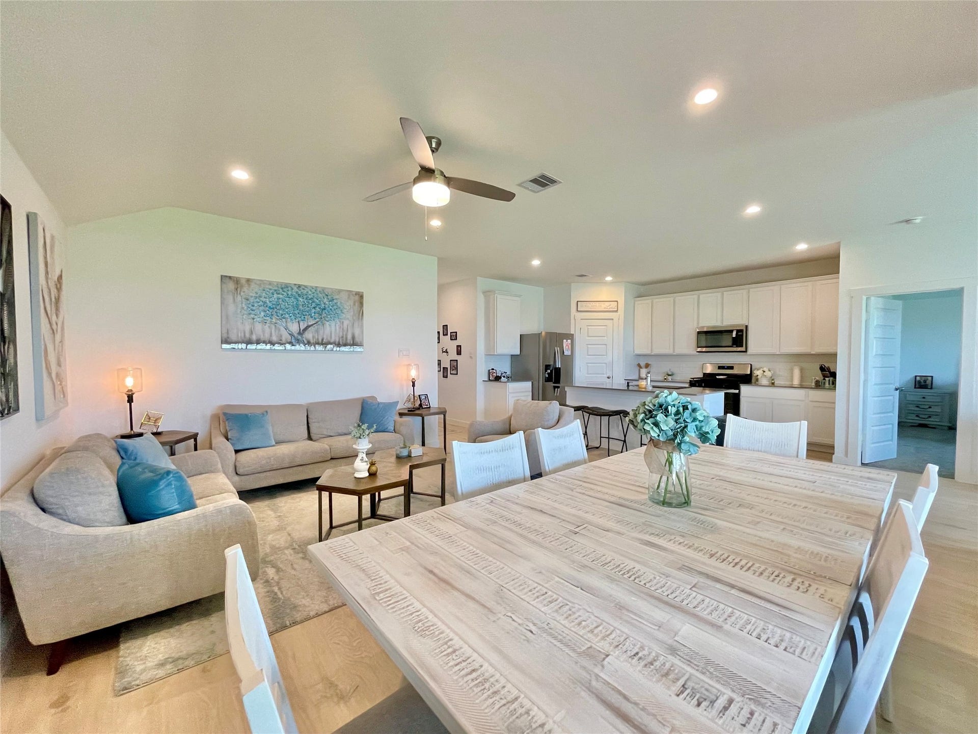 31722 Farlam Farms Trail, Fulshear, TX 77441 An alternate view of the dining hub highlights the fluid, conversational layoutperfect for both daily life and hosting parties.