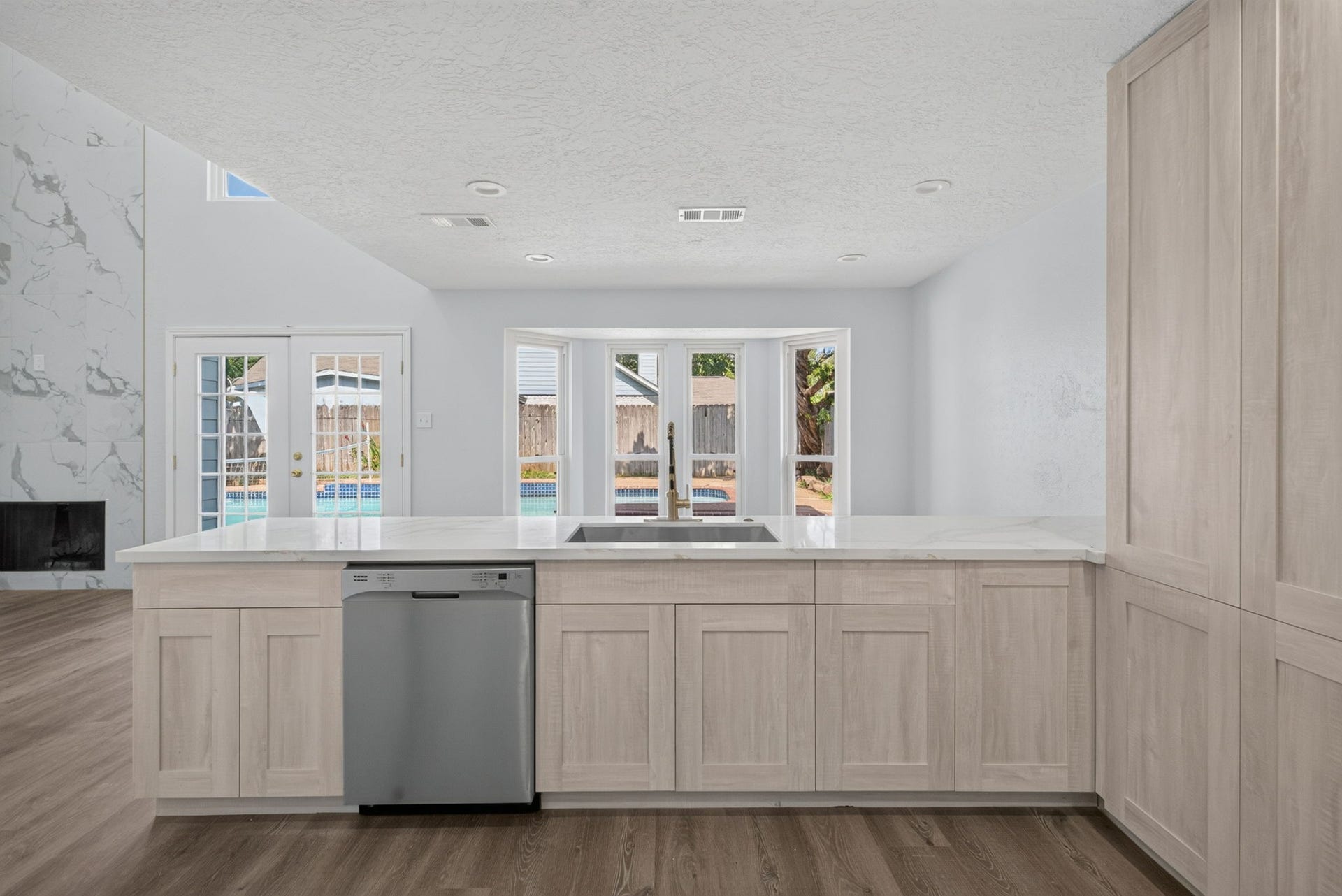 1123 Mayweather Lane, Richmond, TX 77406 Designed to keep everyone connected, this generous counter space makes serving, entertaining, and everyday living feel effortless.