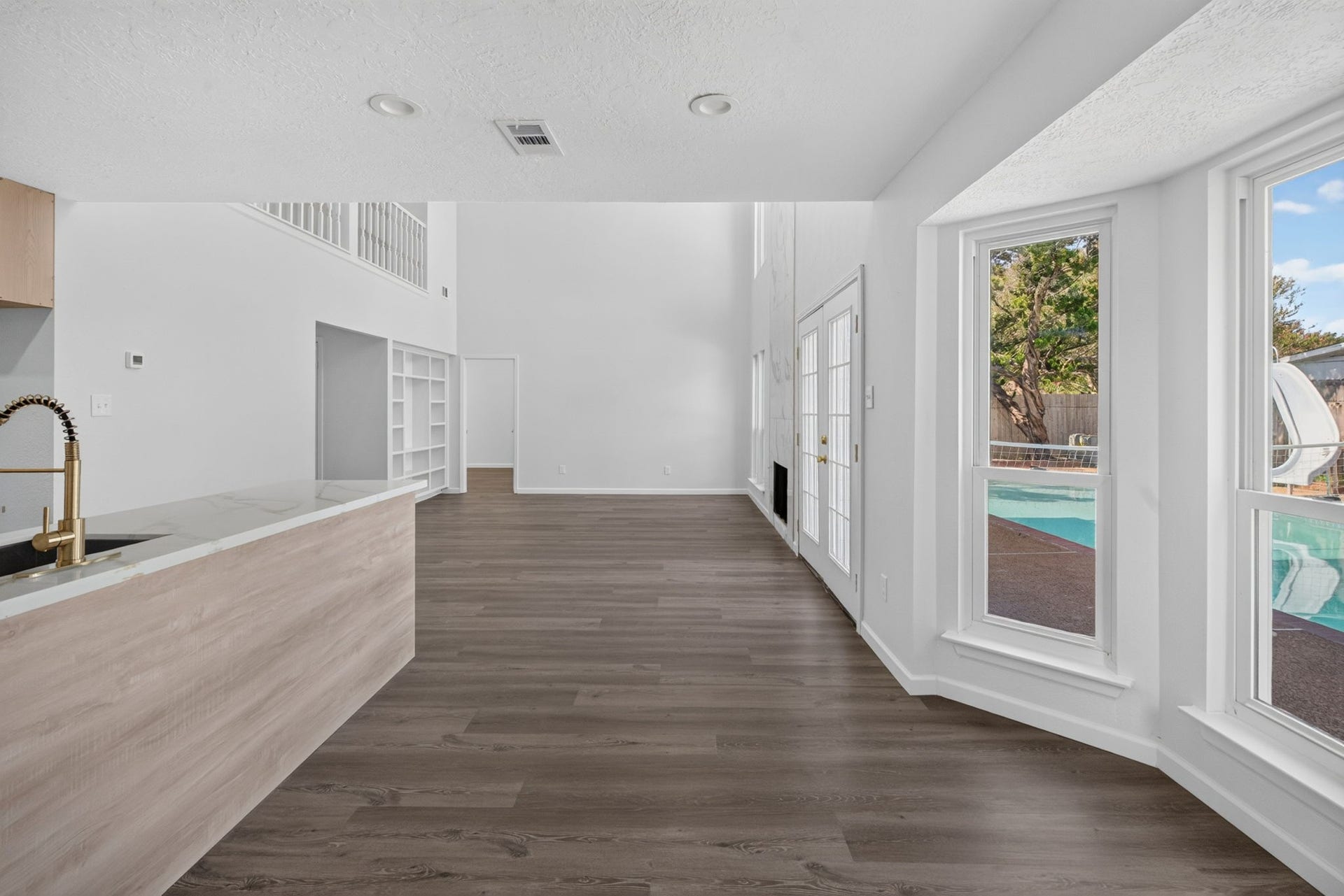 1123 Mayweather Lane, Richmond, TX 77406 Indoor-outdoor living comes naturally here, with an airy open layout and oversized windows bringing the backyard and pool right into view.