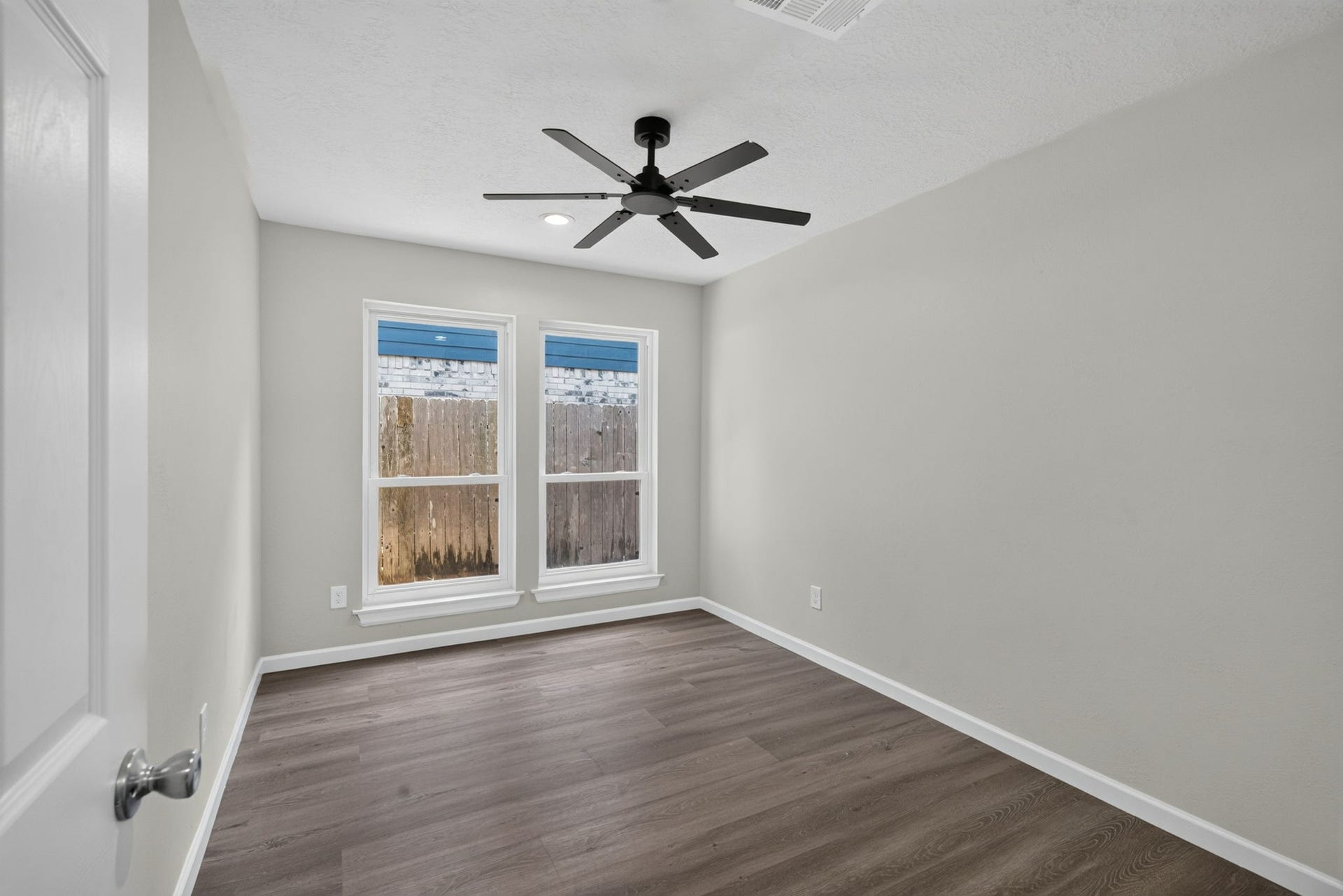 1123 Mayweather Lane, Richmond, TX 77406 Bright, comfortable, and move-in ready, this inviting bedroom offers a peaceful retreat with natural light and warm flooring.