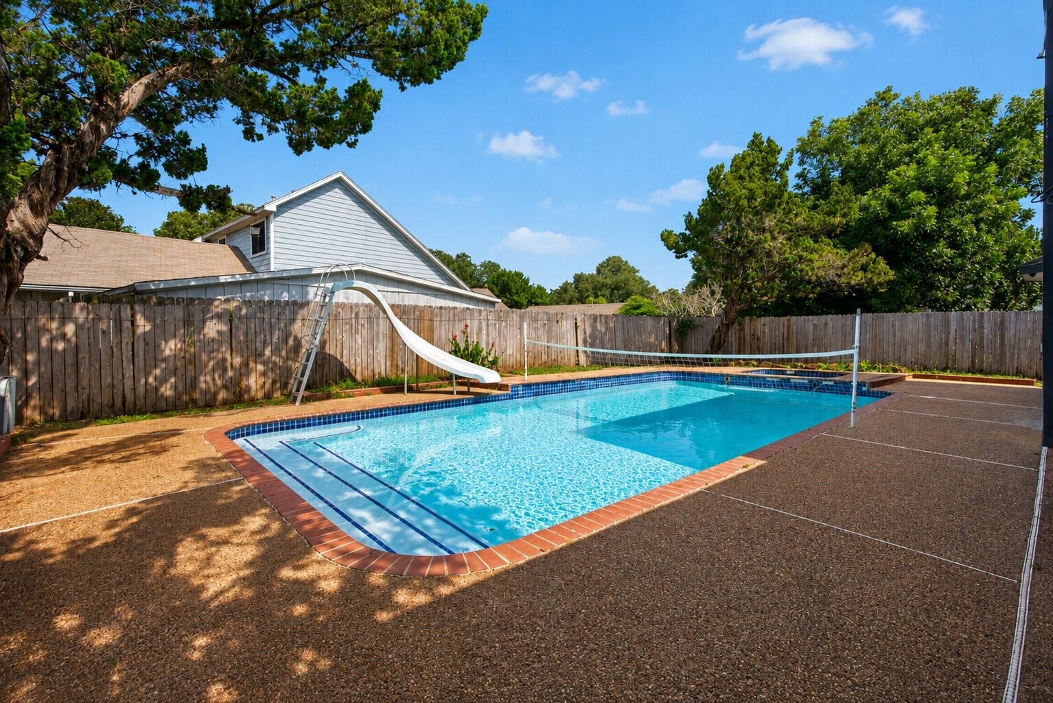 1123 Mayweather Lane, Richmond, TX 77406 Plenty of room to swim, lounge, and entertain makes this outdoor space an undeniable highlight of the home.