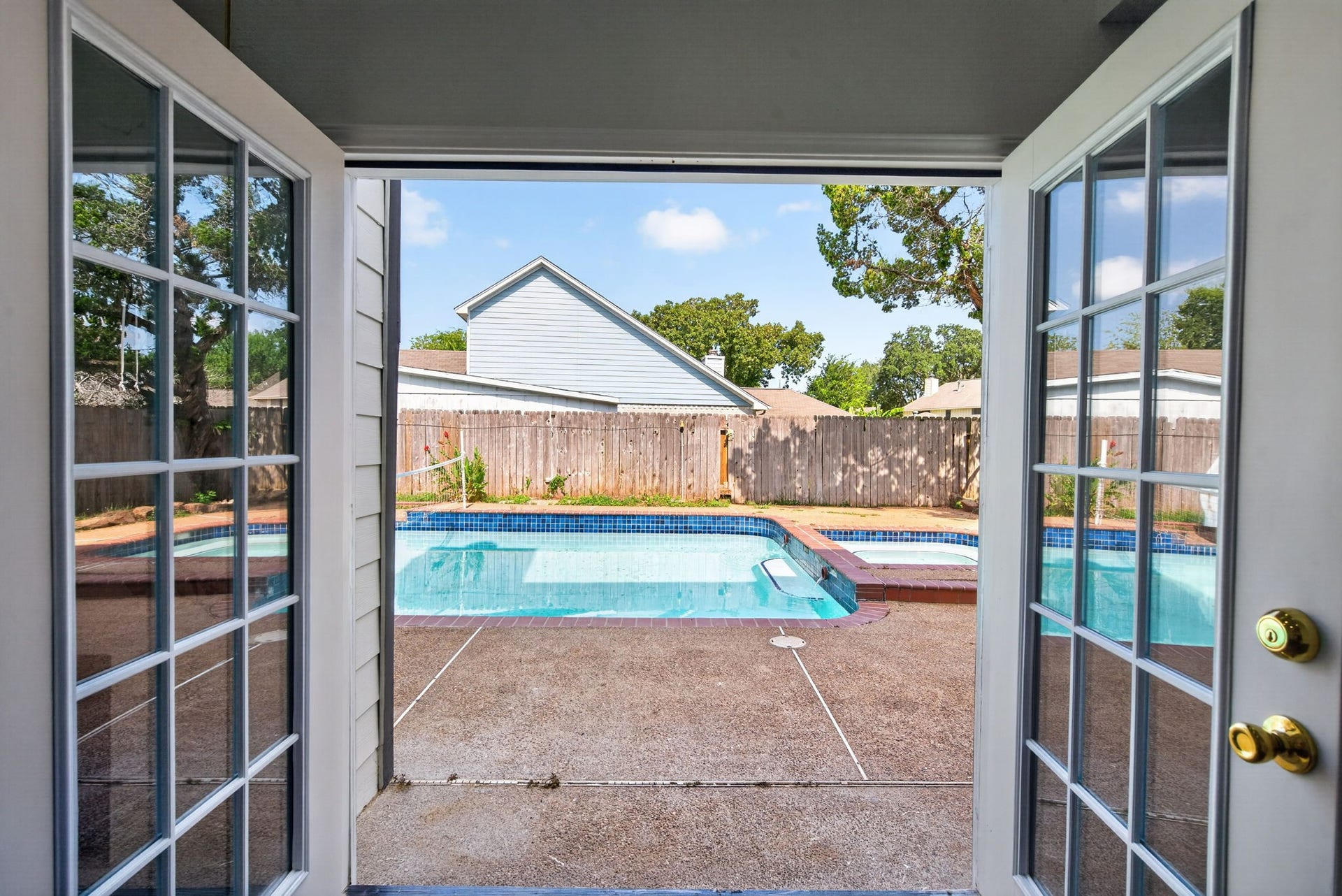 1123 Mayweather Lane, Richmond, TX 77406 Step outside and straight into vacation modeFrench doors create an effortless connection between the home and your private backyard retreat.