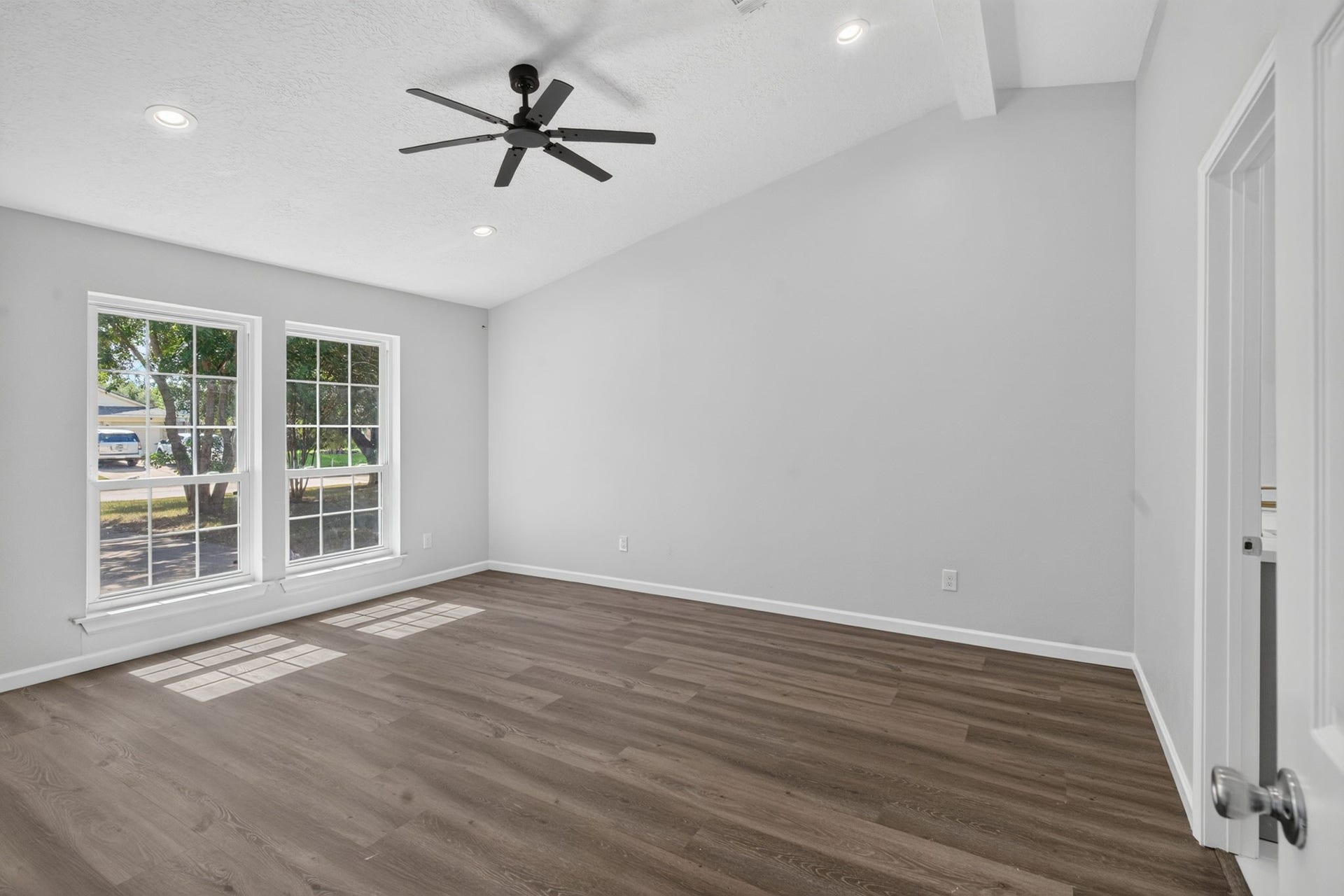 1123 Mayweather Lane, Richmond, TX 77406 Wake up to abundant natural light in a serene primary suite designed to feel open, comfortable, and effortlessly relaxing.