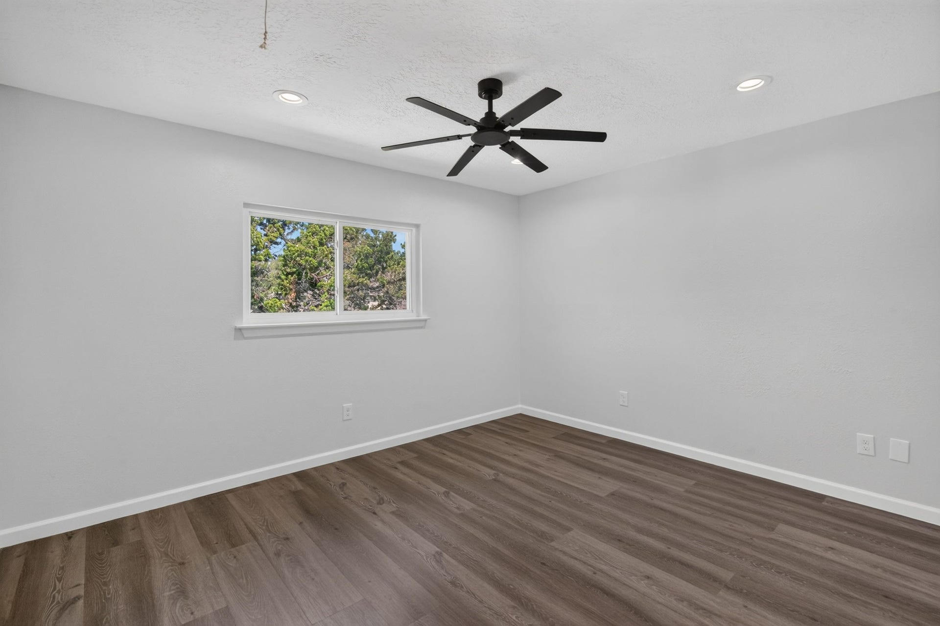 1123 Mayweather Lane, Richmond, TX 77406 A comfortable secondary bedroom offers a clean, versatile canvas ready to become a restful retreat, guest room, or home office.