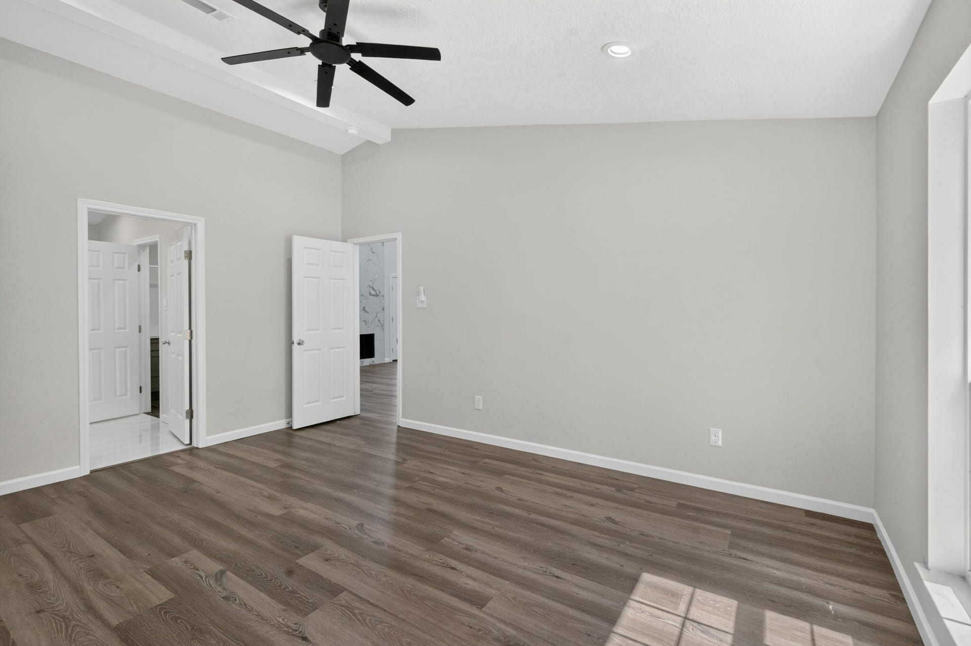 1123 Mayweather Lane, Richmond, TX 77406 A spacious primary retreat with generous proportions, warm natural light, and a private bath just steps away.