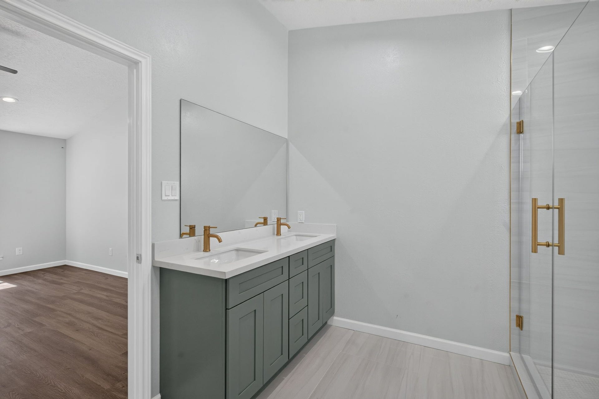 1123 Mayweather Lane, Richmond, TX 77406 Thoughtfully connected to the primary suite, this beautifully finished bath creates a private retreat designed for both style and convenience.