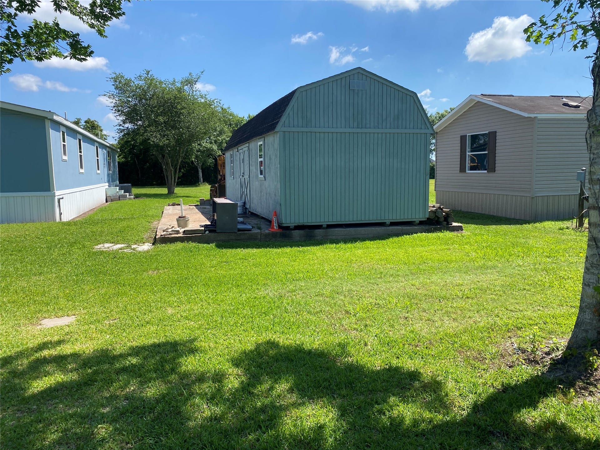 6115 S Highway 35, Alvin, TX 77511 Double wide with a shed
