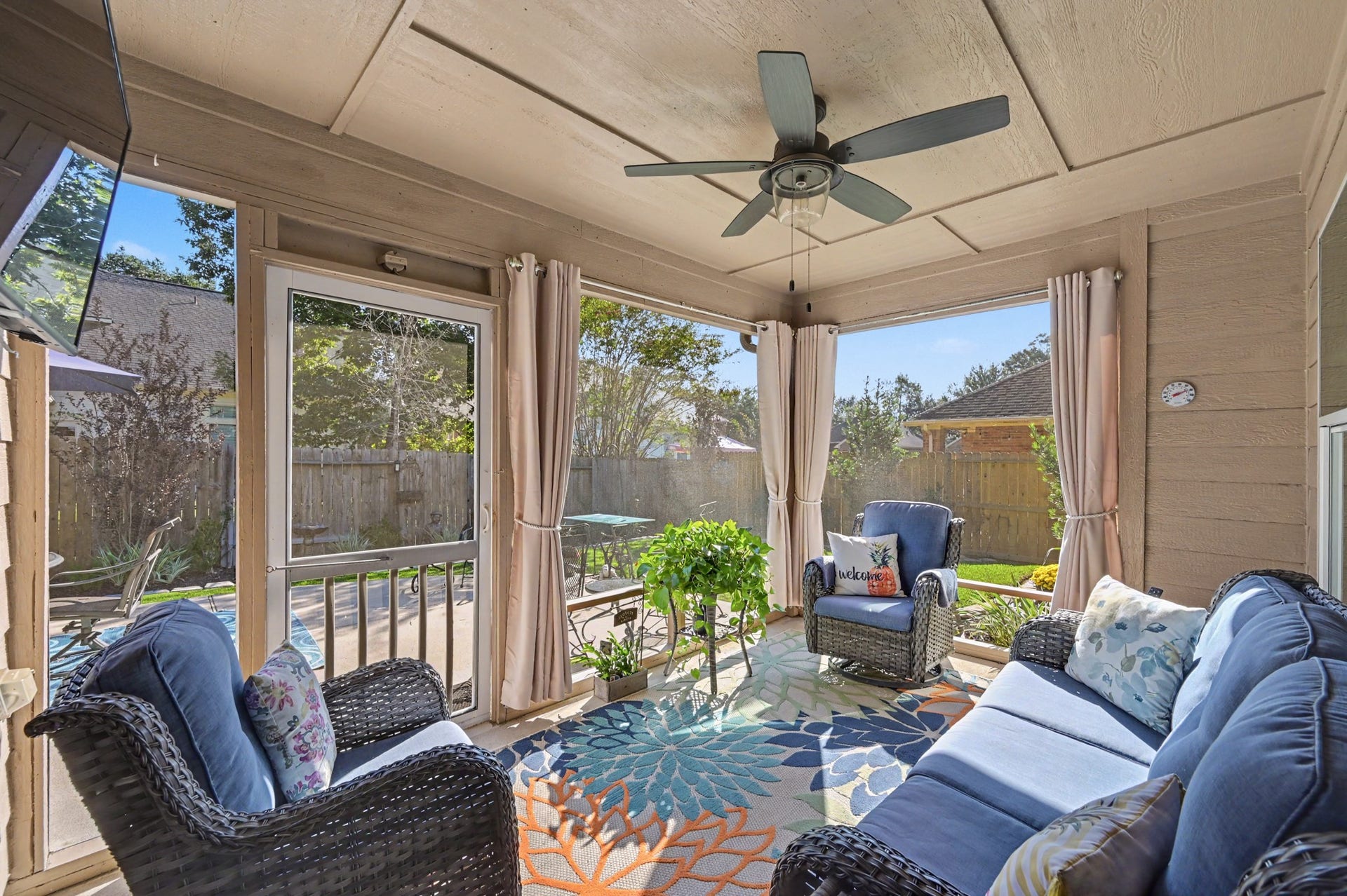 2039 Borthwick Lane, Conroe, TX 77301 Screened in porch. Enjoy the peaceful backyard oasis.
