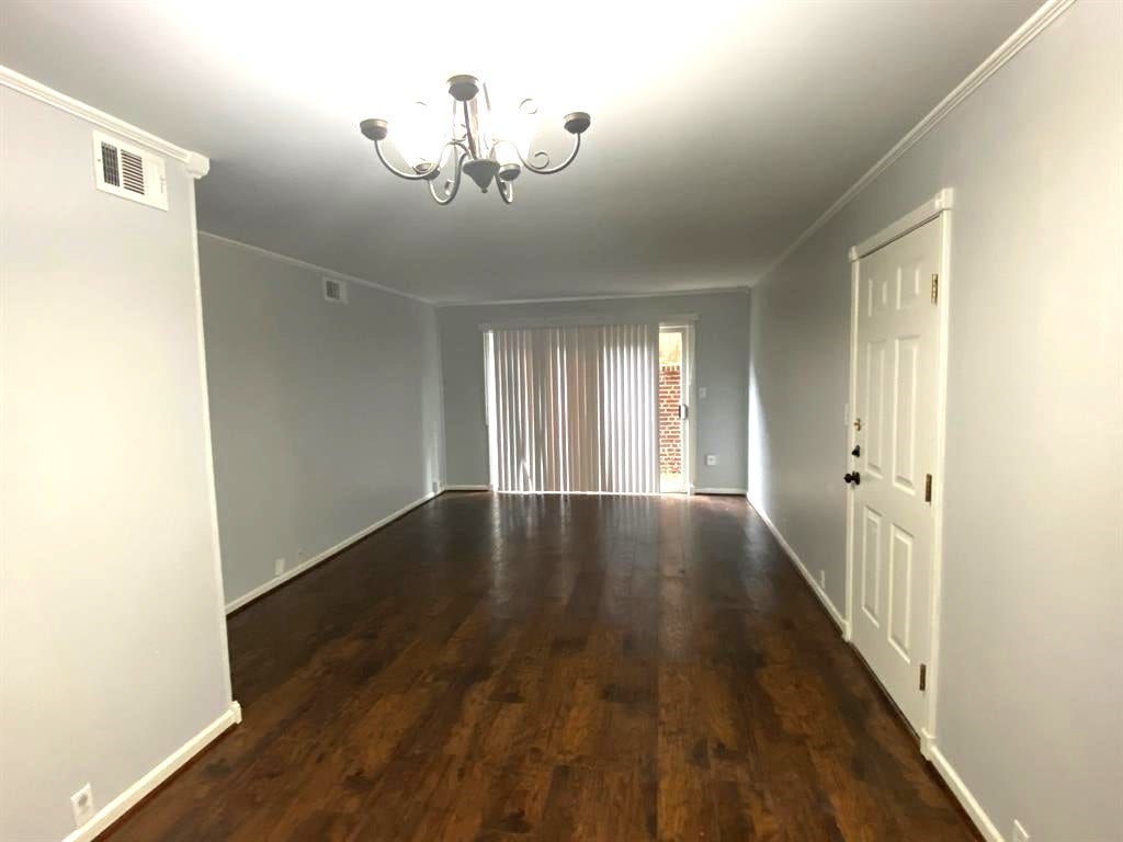 5353 Dora Street, #6, Houston, TX 77005 Living room with access to private patio