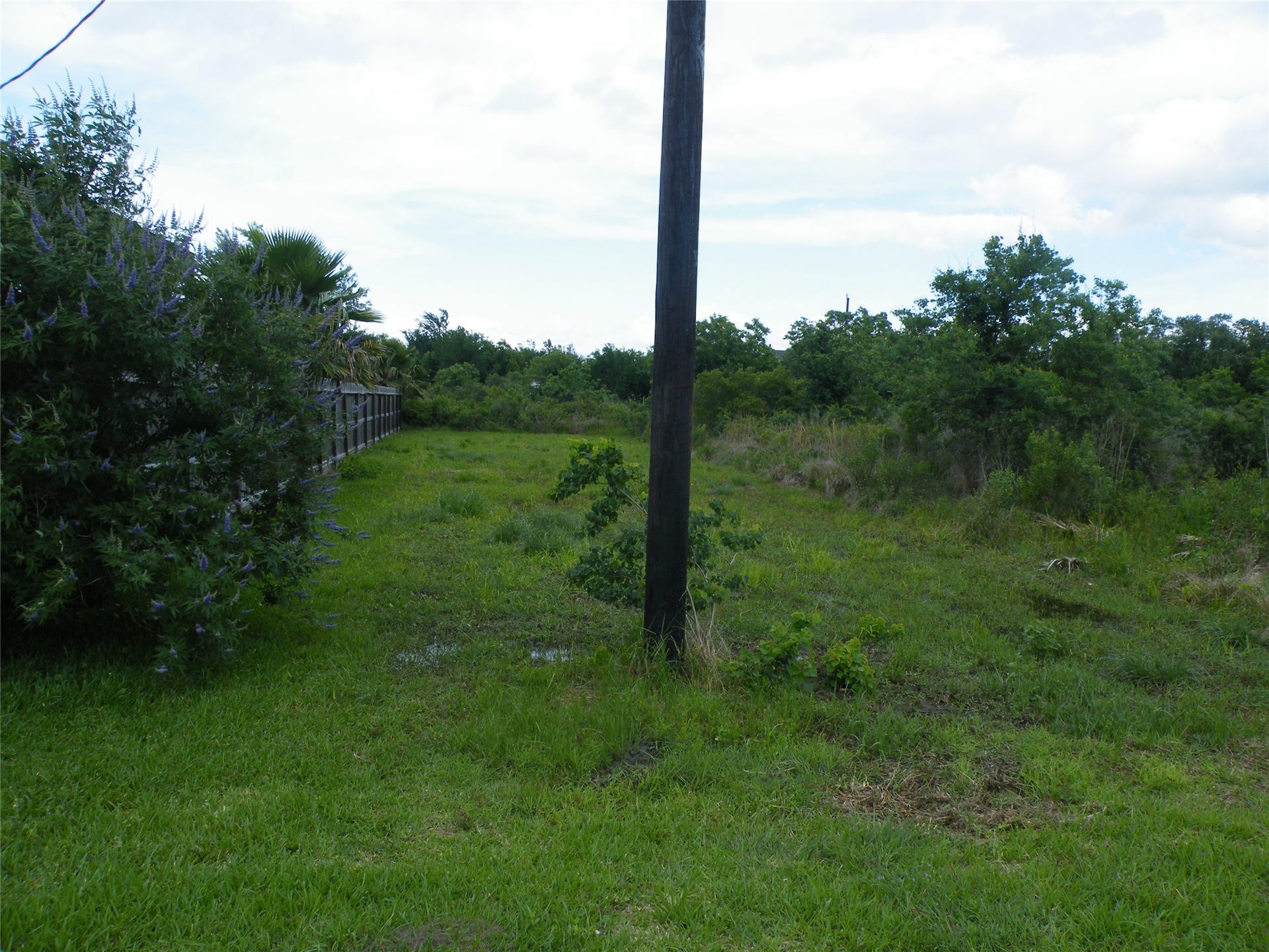 729 17th Street, San Leon, TX 77539 The 3rd lot next door that conveys with the property