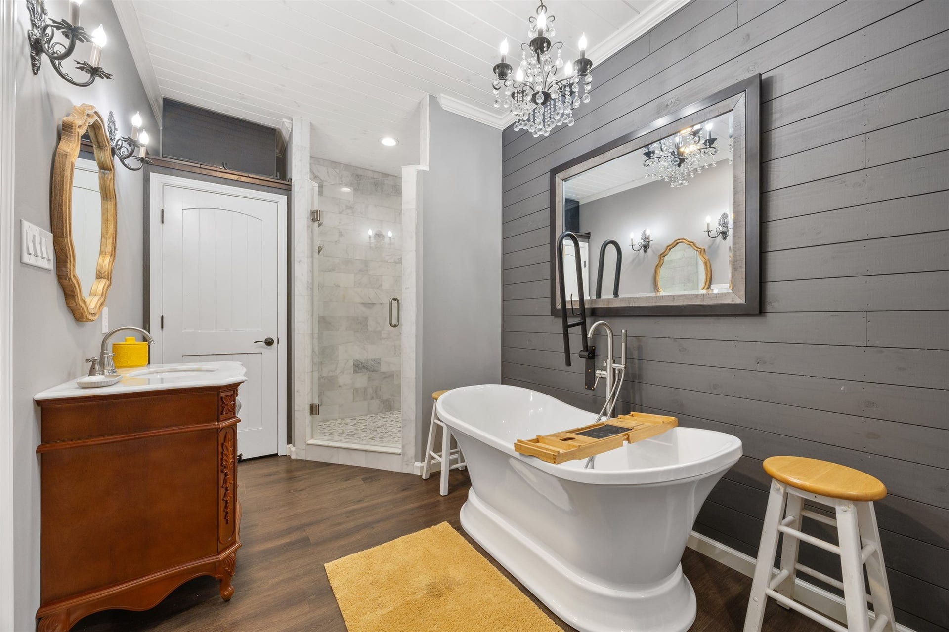 30902 Kate Drive, Magnolia, TX 77355 Who doesn't want to soak in this new bath tub in the primary bathroom. The shower is brand new. The chandeliers and lighting fixtures just make this shine