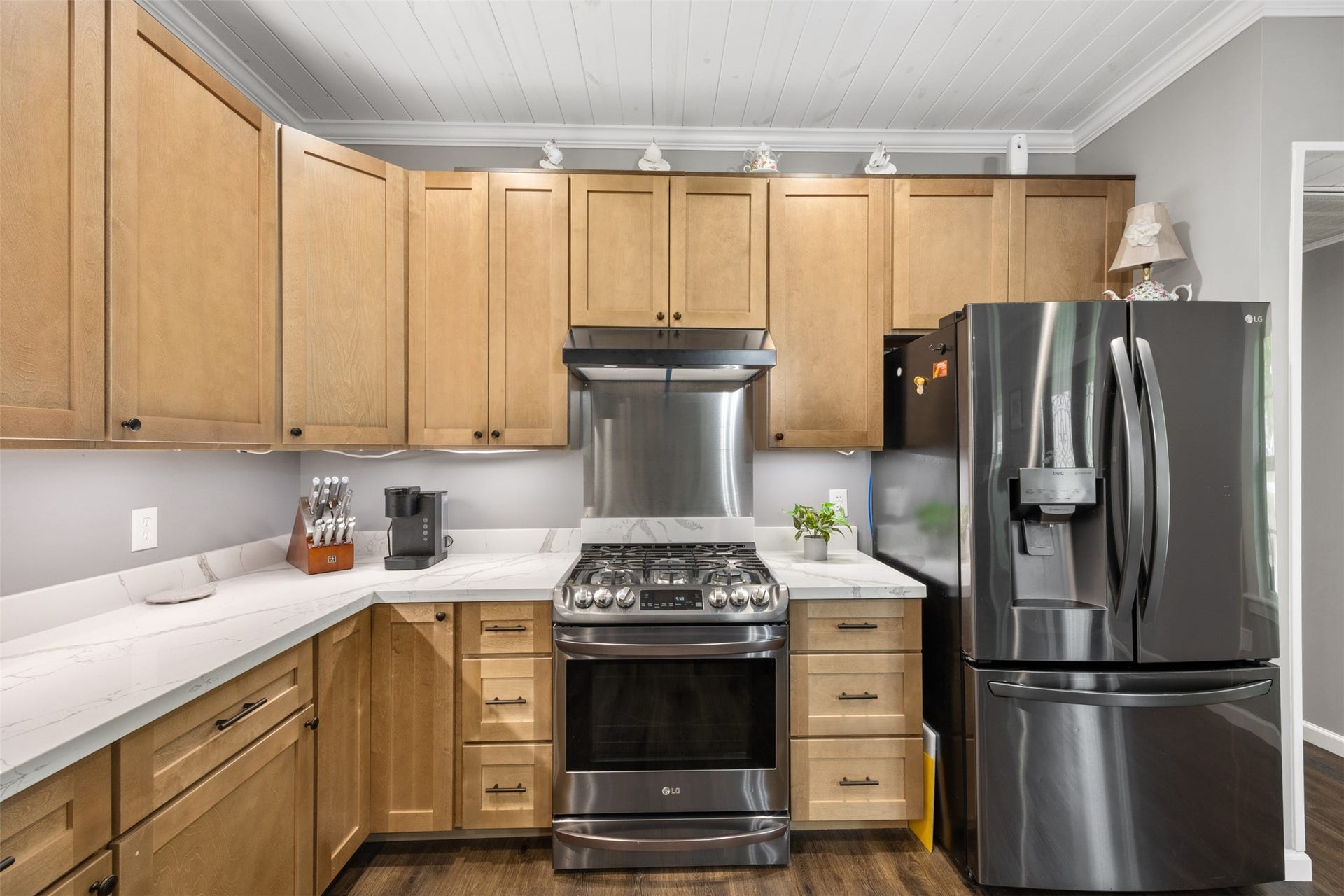 30902 Kate Drive, Magnolia, TX 77355 New wood cabinetry and counter top. The refrigerator stays with the home