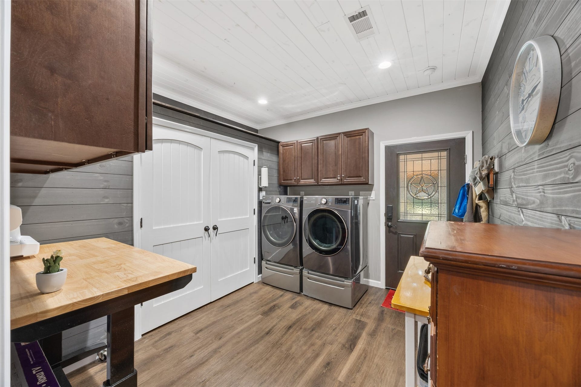 30902 Kate Drive, Magnolia, TX 77355 The utility room exits onto the back porch. Huge pantry and extra storage cabinets. The washer and dryer stays with the home