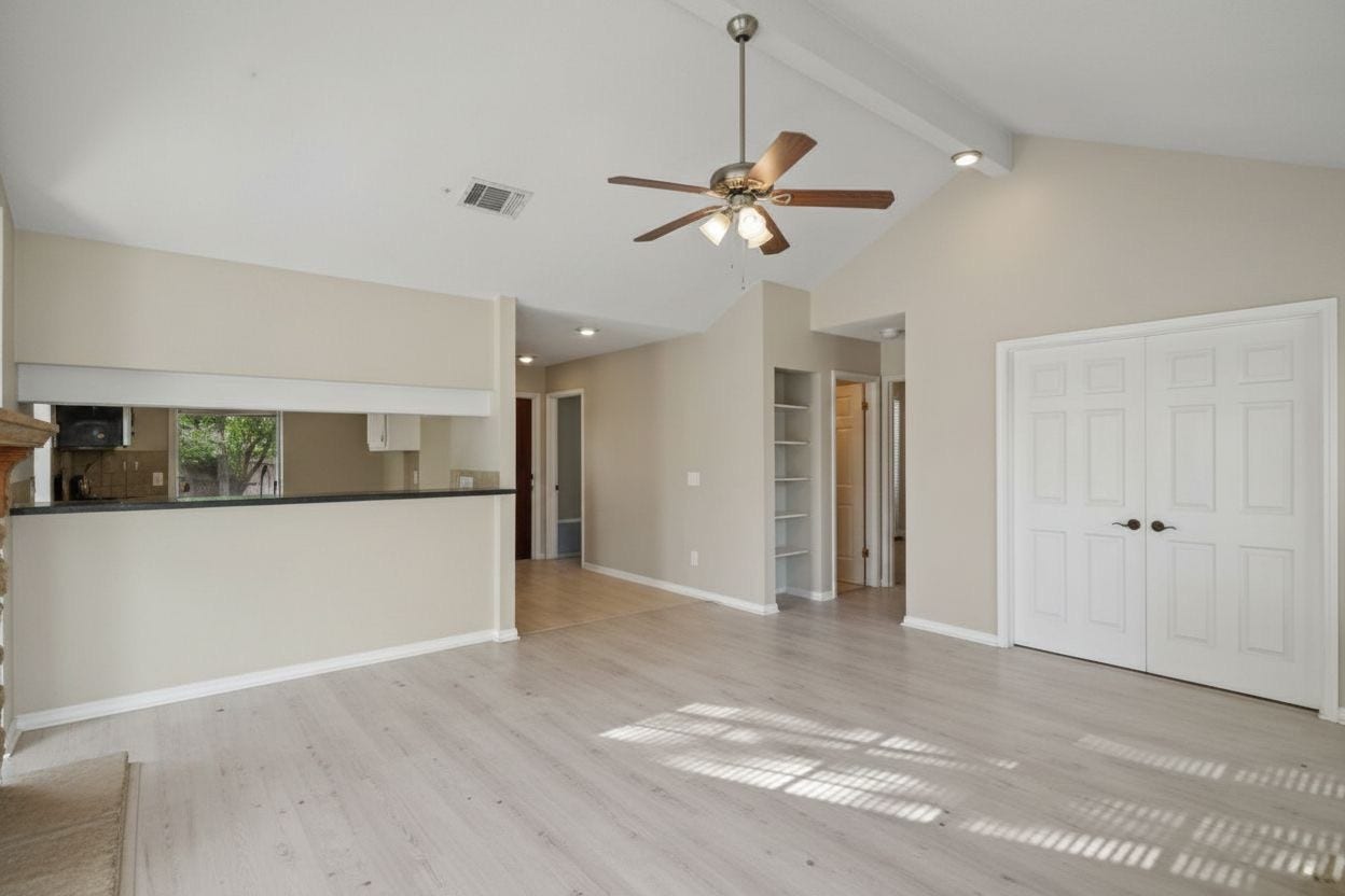 4522 Alamo Avenue, Sugar Land, TX 77479 View of the living area looking toward the kitchen and hallway leading to the bedrooms.
